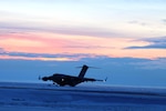 A U.S. Air Force C-17 Globemaster landing on the icy tarmac at Deadhorse, Alaska, after successfully deploying part of a Stryker platoon assigned to U.S. Army Alaska's Bravo Company, 3-21 Infantry Regiment, 1st Stryker Brigade Combat Team, Nov. 3, 2015. Operation Arctic Pegasus is U.S. Army Alaska's annual joint exercise designed to test rapid-deployment and readiness in the Arctic. The exercise marks the first time Strykers have deployed above the Arctic Circle. The 1st Stryker Brigade Combat Team is the Army's northernmost unit and has the unique capability to deploy and operate in extreme cold regions. (Photo by Capt. Richard Packer, U.S. Army Alaska Public Affairs)