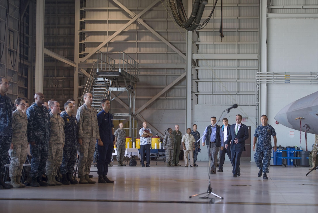 Defense Secretary Ash Carter walks with Navy Adm. Harry B. Harry Jr., commander of U.S. Pacific Command, as he arrives to speak with service members on Joint Base Pearl Harbor-Hickam in Honolulu, Nov. 6, 2015. DoD photo by Air Force Senior Master Sgt. Adrian Cadiz