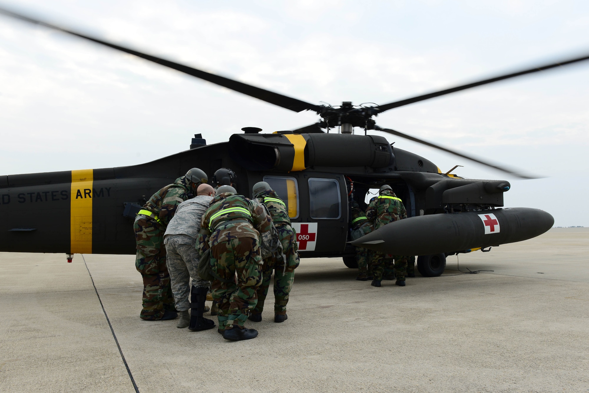 U.S. Air Force and Army medical personnel participated in a medical evacuation exercise as a part of the VIGILANT ACE 16 peninsula wide exercise at Kunsan Air Base, Republic of Korea, Nov. 5, 2015. The medical evacuation exercise, or medevac, tested the 8th Medical Groups ability to safely and quickly get injured personnel the help they need through air transportation provided by the Army. (U.S. Air Force photo by Senior Airman Ashley L. Gardner/Released)
