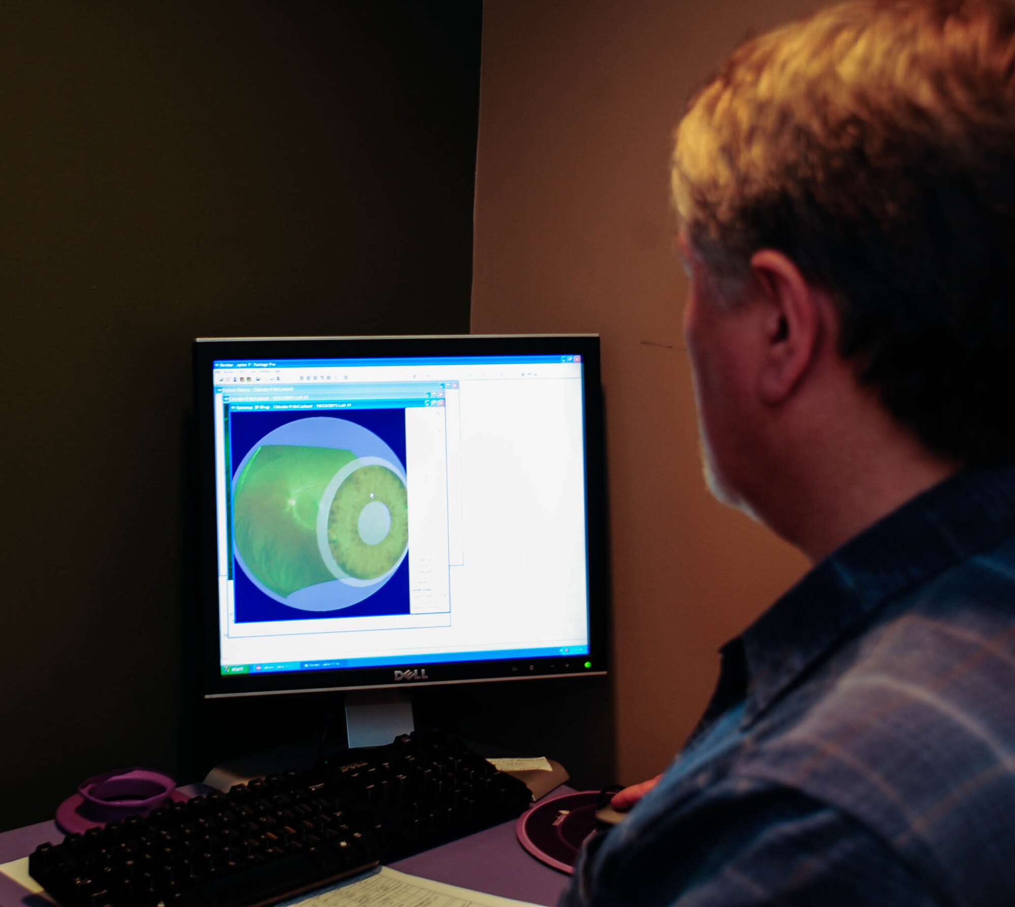 Michael Hoskins, 2nd Aerospace Medicine Squadron civilian, reviews a patients’ retinal eye scan at Barksdale Air Force Base, La., Oct. 22, 2015.The retinal image provides an optometrist with a digital ultra-wide, high definition view of the patient’s retina on a computer screen  (U.S. Air Force photo/Staff Sgt. Jason McCasland) 