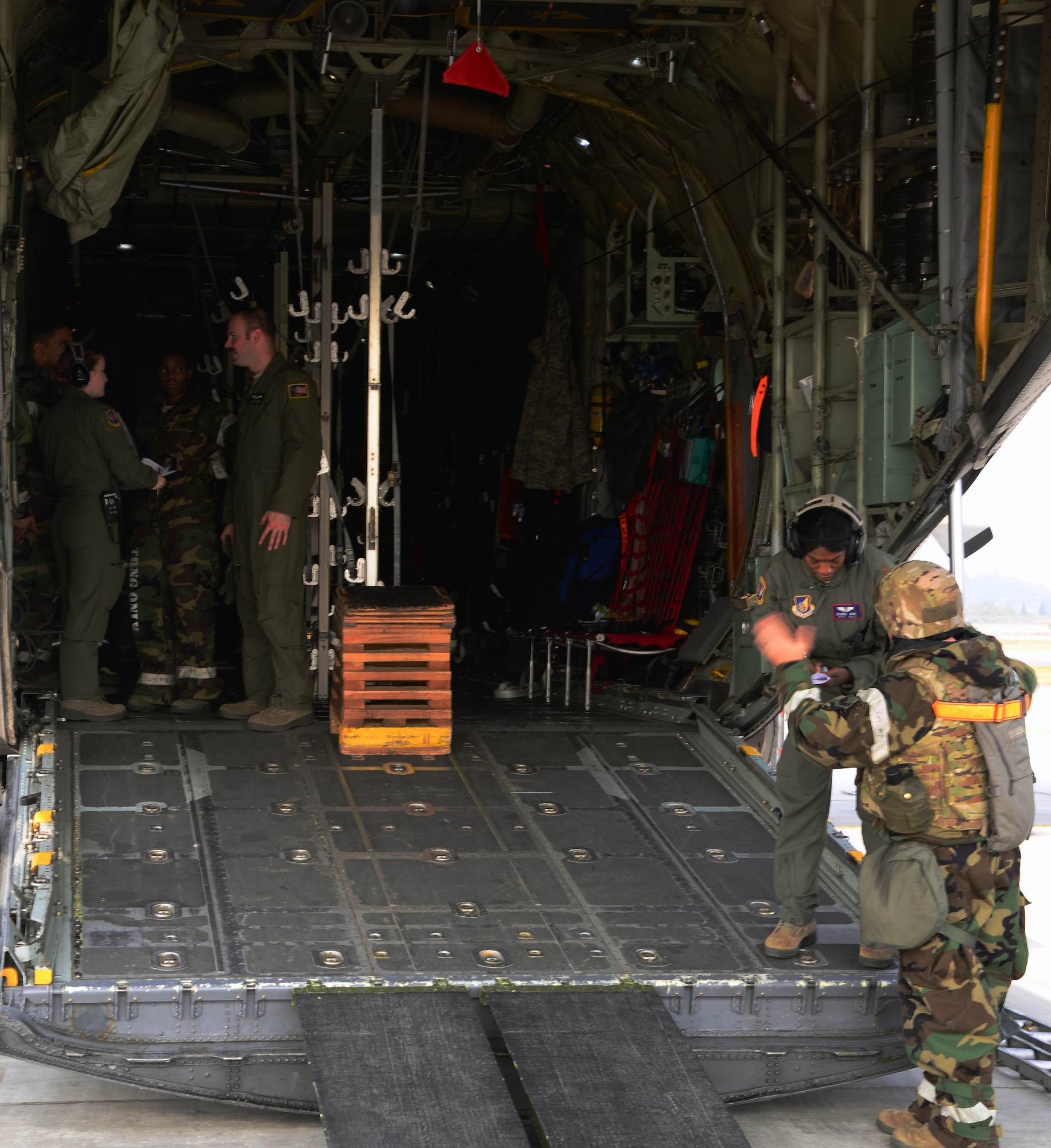 Air National Guard members from the 144th Airlift Squadron, Joint Base Elmendorf-Richardson, Alaska, and active-duty members from the 18th Aeromedical Evacuation Squadron, Kadena Air Base, Japan, prepare for simulated evacuation victims during Joint Base Elmendorf-Richardson, , Nov. 5, 2015, at Osan Air Base, Republic of Korea. More than eight squadrons from three seperate bases across Pacific Air Forces are participating in Vigilant Ace 16, a large-scale exercise designed to enhance the interoperability of the U.S. and Republic of Korea Air Forces. (U.S. Air Force photo/Staff Sgt. Benjamin Sutton)