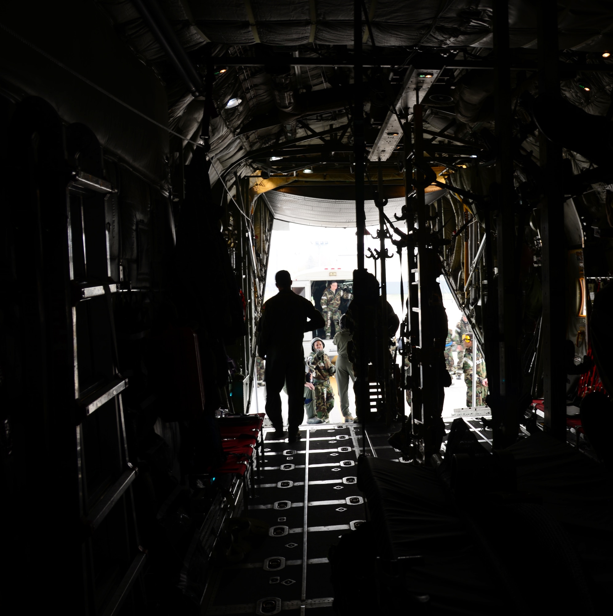 Airmen assigned to the 18th Aeromedical Evacuation Squadron from Kadena Air Base, Japan, prepare to load simulated casualty victims during readiness exercise Vigilant Ace 16 at Osan Air Base, Republic of Korea, Nov. 5, 2015. The 18 AES is participating in Vigilant Ace 16, a large-scale exercise designed to enhance combat capabilities and interoperability of the U.S. and Republic of Korea Air Forces. (U.S. Air Force photo/Staff Sgt. Benjamin Sutton)