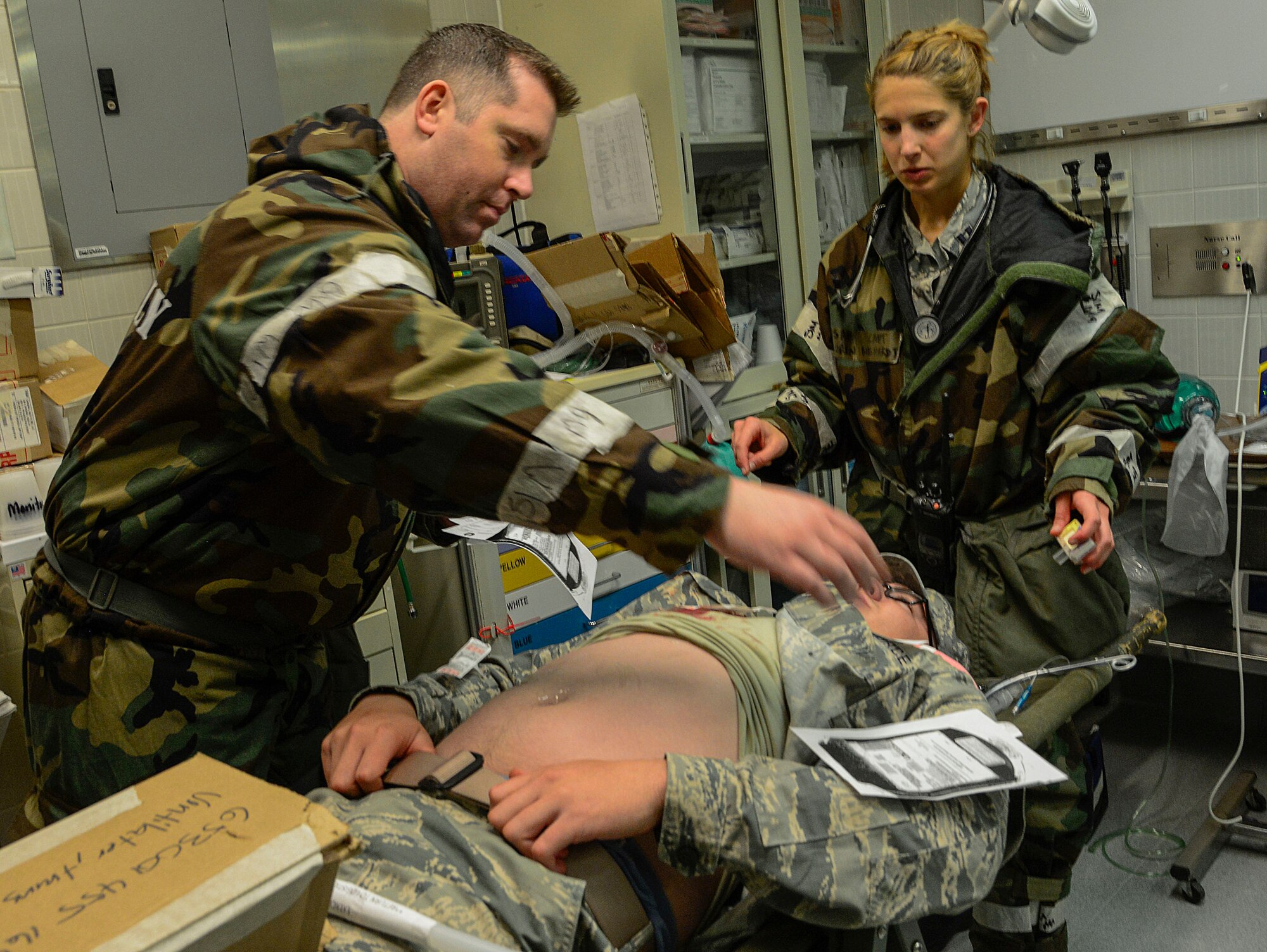 Capt. Stephen Hubatsek, 51st Medical Operations Squadron clinical nurse, simulates giving a patient blood during the Vigilant Ace 16 exercise on Osan Air Base, Republic of Korea, Nov. 3, 2015. The exercise is an annual peninsula-wide combined operation between U.S. forces and ROK allies to enhance operational and tactical level coordination  through combined and joint combat training. The MDOS Airmen are utilizing the exercise to hone vital skills in the event of real-world contingencies by actively role-playing with patients who have simulated injuries. (U.S. Air Force photo/Senior Airman Kristin High)