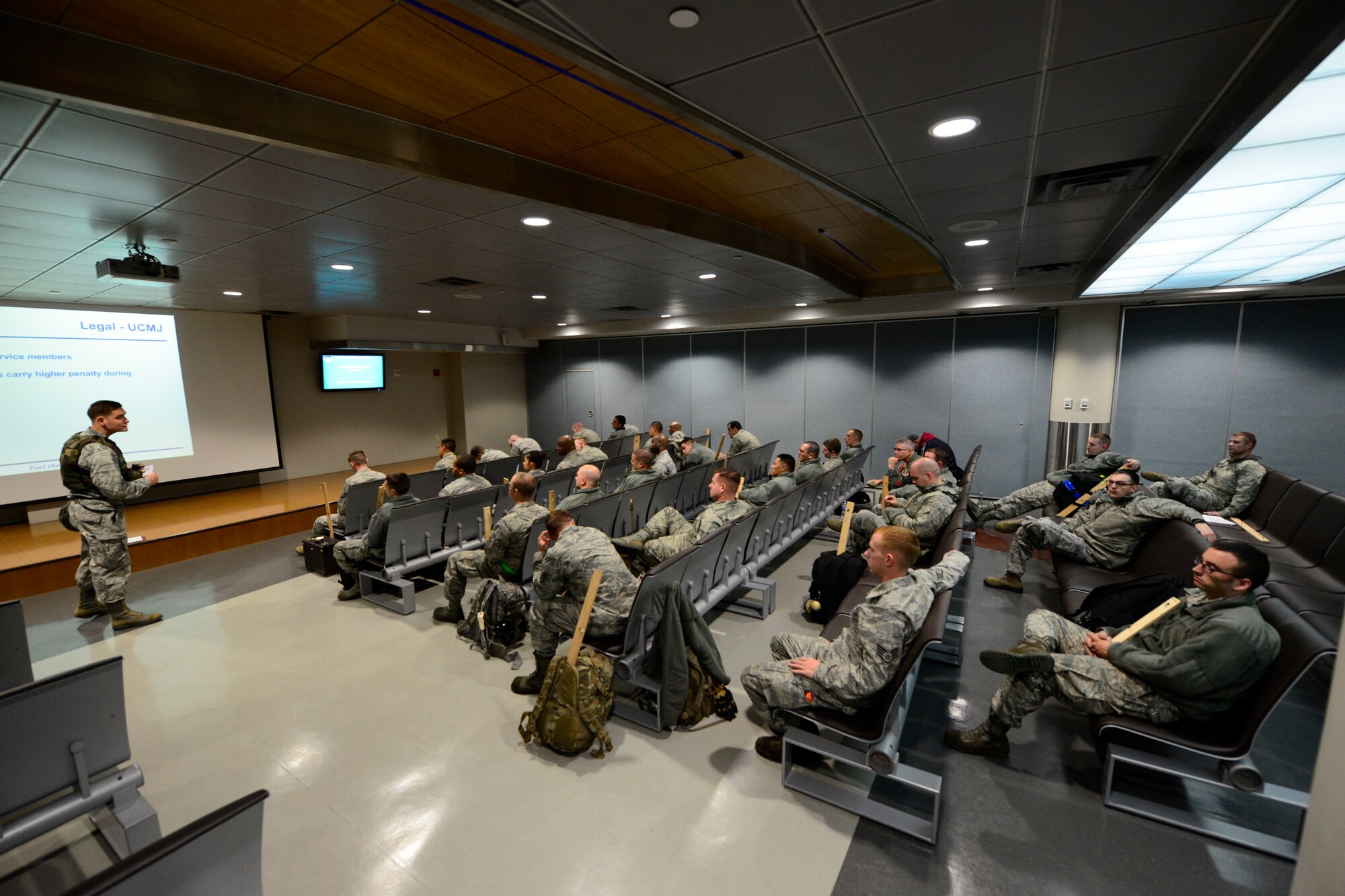 Augmentee Airmen from the 35th Fighter Wing, Misawa Air Base, Japan, listen to an inbound briefing during the Vigilant Ace 16 exercise on Osan Air Base, Republic of Korea, Nov. 2, 2015. The Airmen deployed to the peninsula to participate with more than 16,000 personnel in an effort to practice various combat training scenerios between the U.S. and ROK forces. (U.S. Air Force photo/Senior Airman Kristin High)