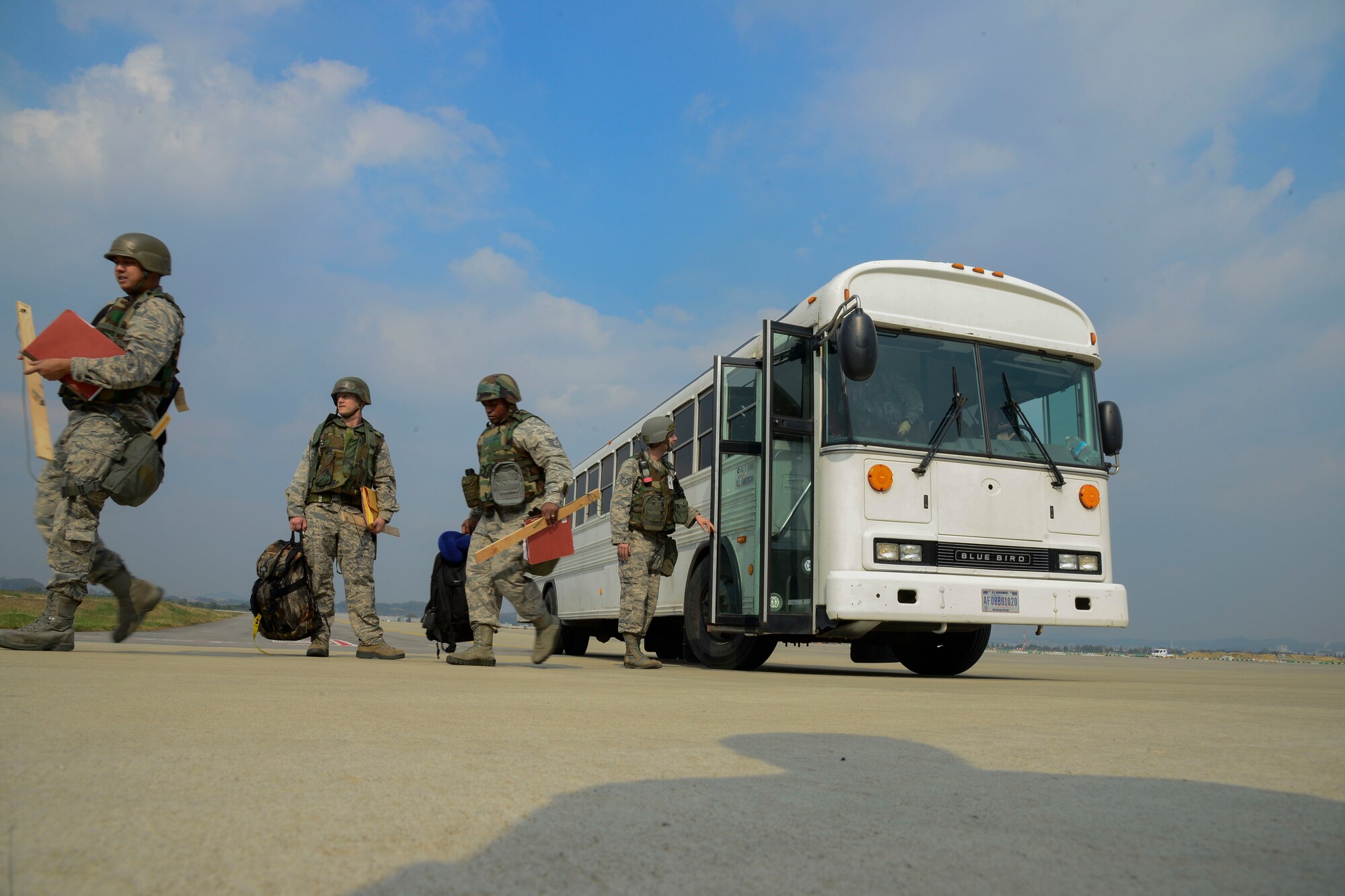 Augmentee Airmen from the 35th Fighter Wing, Misawa Air Base, Japan, unload from a bus at the passenger terminal during the Vigilant Ace 16 exercise on Osan Air Base, Republic of Korea, Nov. 2, 2015. More than 1,000 Airmen and Marines deployed to the peninsula to play in the annual exercise, formerly known as Beverly Bulldog. The exercise gives ROK and U.S. forces the opportunity to train together, enhancing operational and tactical level coordination through combined and joint combat training. (U.S. Air Force photo/Senior Airman Kristin High)