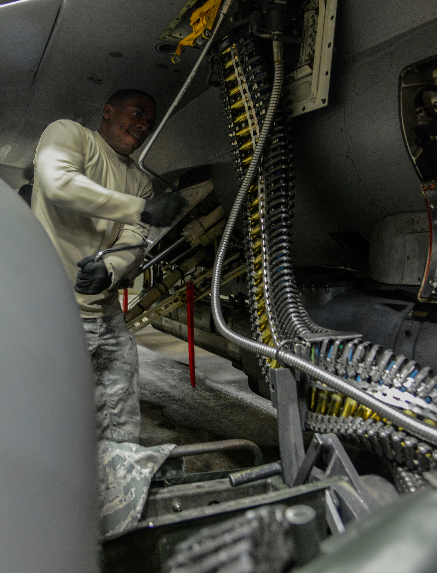 Senior Airman Allen Avery III, 36th Aircraft Maintenance Squadron F-16 Fighting Falcon weapons load crew member, loads 20-mm rounds into the aircraft during the Vigilant Ace 16 exercise on Osan Air Base, Republic of Korea, Nov. 2, 2015. The F-16 can hold more than 500 rounds of ammunition along with external stations carrying up to six air-to-air missiles, conventional air-to-air and air-to-surface munitions and electronic countermeasure pods. (U.S. Air Force photo/Senior Airman Kristin High)