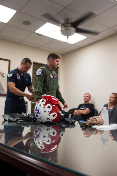Lt. Chad Roe, Valdosta firefighter and Moody’s Hometown Hero, suits up before his hero flight in a U.S. Air Force Thunderbirds F-16D Fighting Falcon, Nov. 5, 2015, at Moody Air Force Base, Ga. Roe served in the Air Force for three years as a crew chief before returning to his local community of Valdosta, Ga., to become a firefighter. (U.S. Air Force photo by Senior Airman Ceaira Tinsley/Released)