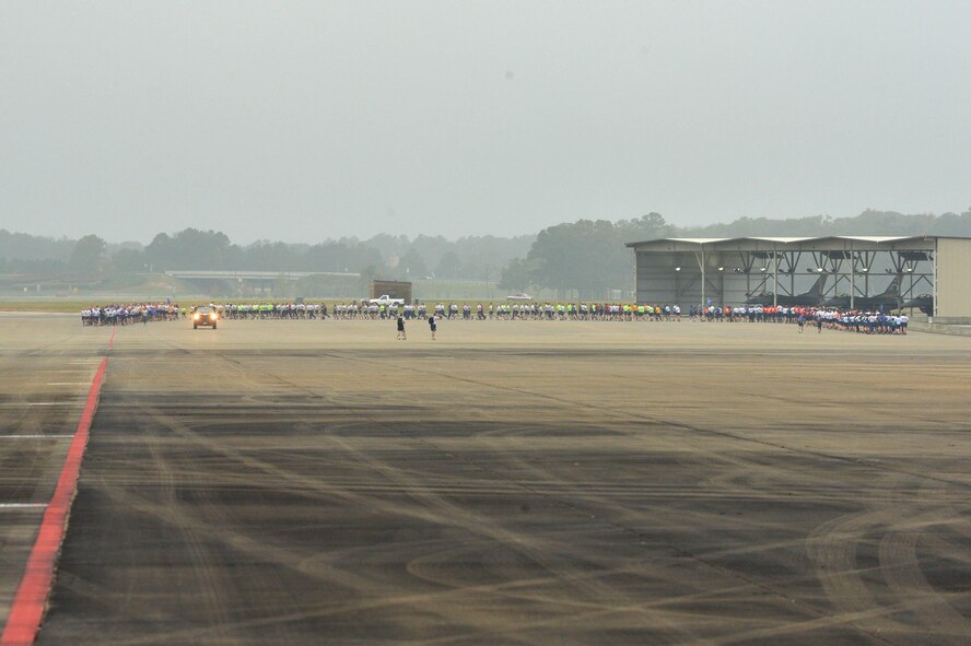 U.S. Airmen run down the taxiway during a 20th Fighter Wing Airman’s run at Shaw Air Force Base, S.C., Nov. 6, 2015. The Airmen called jodies during the run which symbolized the “Airman’s Run,” an event graduating Airmen participate in during Basic Military Training. (U.S. Air Force photo by Senior Airman Diana Cossaboom)