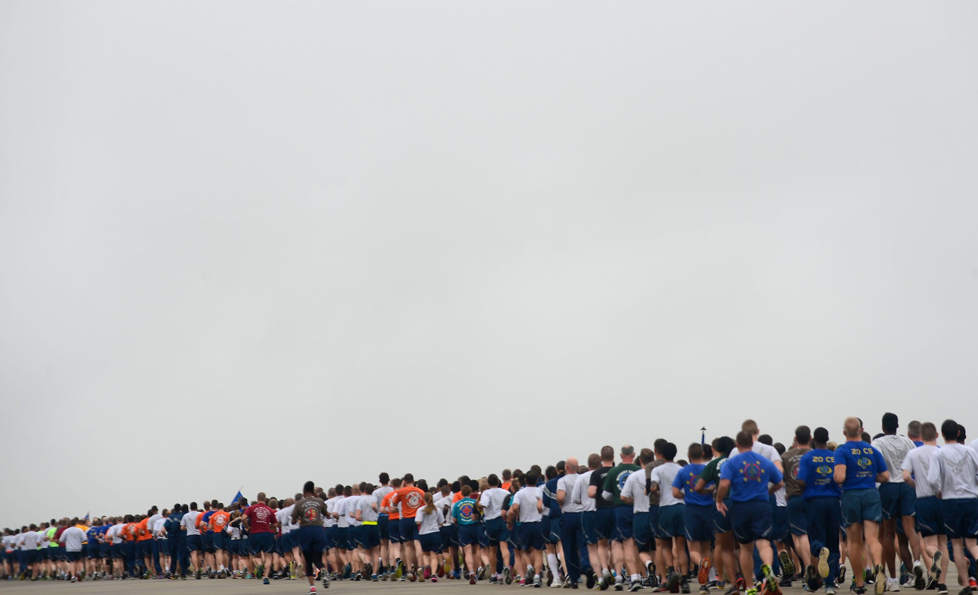 U.S. Airmen assigned to the 20th Fighter Wing, participate in an Airman’s run at Shaw Air Force Base, S.C., Nov. 6, 2015. The run was held to strengthen camaraderie throughout the 20th FW, as well as emphasize the importance each Airman has to the mission. (U.S. Air Force photo by Senior Airman Jensen Stidham)
