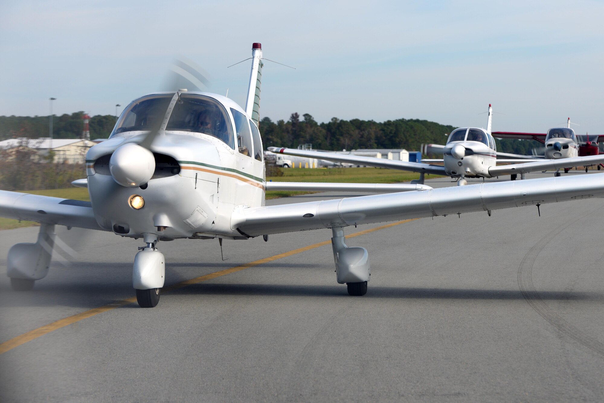Aircraft standby as they await takeoff during the Scare-A-Controller event, Oct. 31, 2015, at Wayne Executive Jetport in Goldsboro, North Carolina. More than 40 sorties were executed in support of the event. (U.S. Air Force photo/Senior Airman John Nieves Camacho)