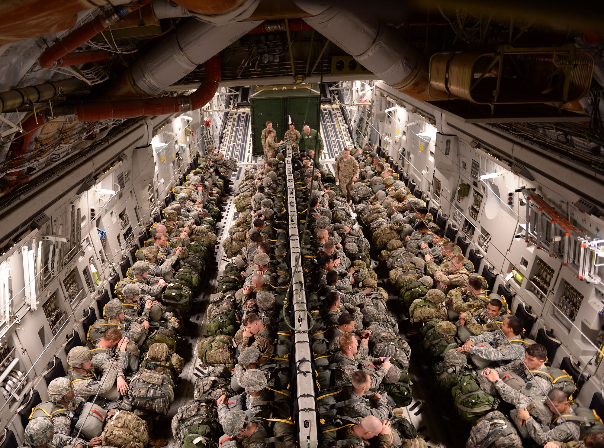 Approximately 200 members from the U.S. Army’s 82nd Airborne Division partnered with 18th Air Force’s Joint Base Charleston, S.C., C-17 Globemaster III crews for a practice jump over Pope Air Force Base, N.C., Nov. 2, 2015, in preparation for Exercise Ultimate Reach Nov. 2-8 in Spain. Ultimate Reach is an annual U.S. Transportation Command-sponsored live-fly exercise designed to exercise the ability of 18th Air Force’s transportation units to plan and conduct strategic airdrop missions. This year’s rendition of Ultimate Reach partners with NATO Exercise Trident Juncture, which is currently being held throughout locations in Europe. The exercise serves to enhance the 18th Air Force’s interoperability and partnership with NATO allies and sister services. (U.S. Air Force photo by Senior Airman Christopher Reel)