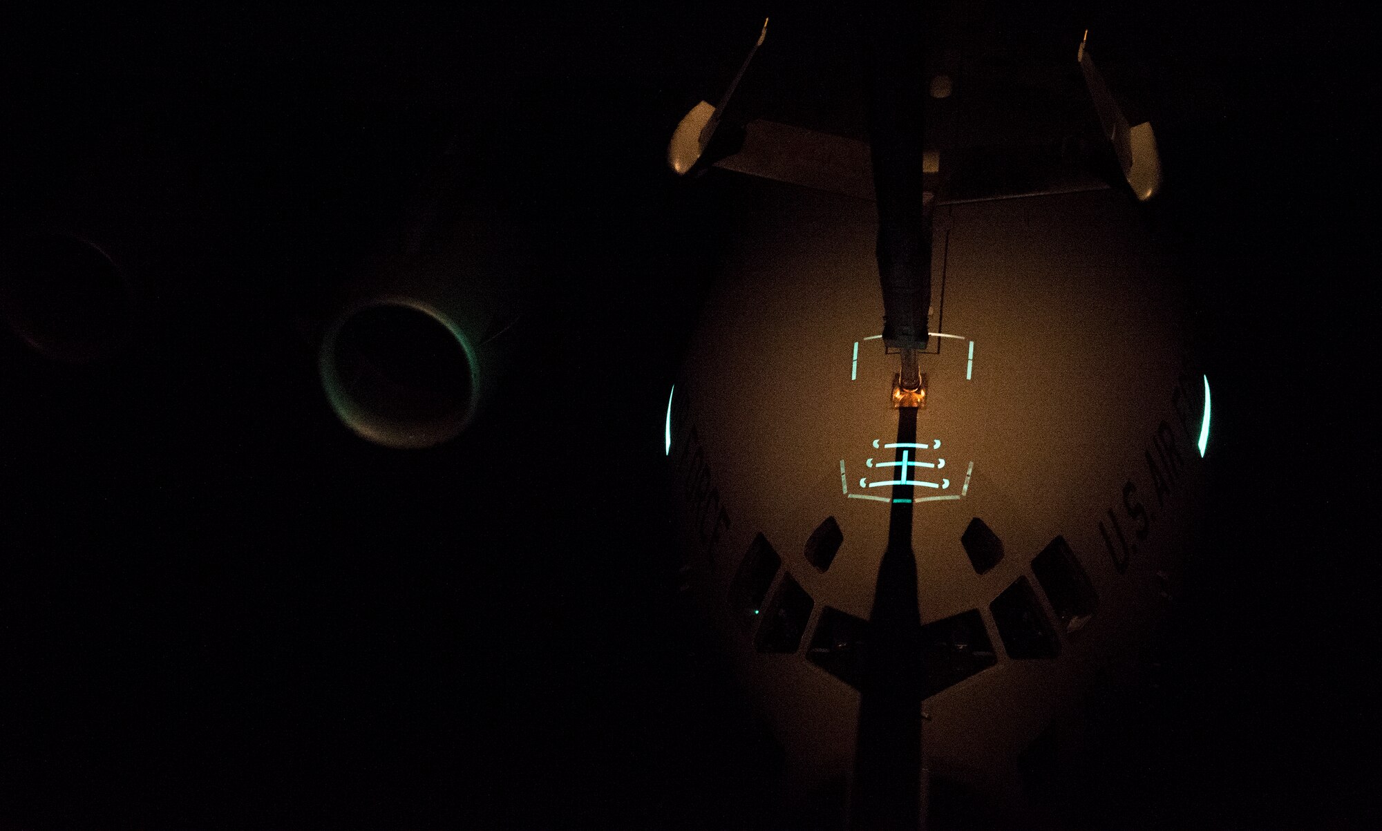 A U.S. Air Force C-17 Globemaster III receives fuel from a KC-10 Extender while flying over the Atlantic Ocean during Trident Juncture 2015, Nov. 3, 2015. Without the refueling capability of the KC-10, the C-17s would not have enough fuel to make it all the way to Spain from the U.S. (U.S. Air Force photo by Staff Sgt. Douglas Ellis)