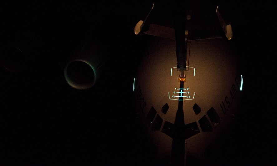 A U.S. Air Force C-17 Globemaster III receives fuel from a KC-10 Extender while flying over the Atlantic Ocean during Trident Juncture 2015, Nov. 3, 2015. Without the refueling capability of the KC-10, the C-17s would not have enough fuel to make it all the way to Spain from the U.S. (U.S. Air Force photo by Staff Sgt. Douglas Ellis)