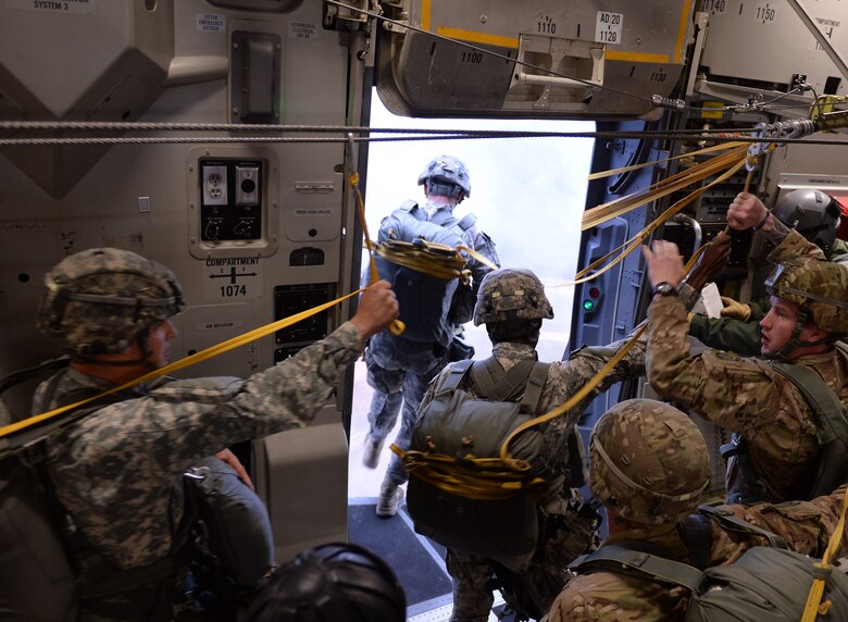 Approximately 200 members from the U.S. Army’s 82nd Airborne Division partnered with 18th Air Force’s Joint Base Charleston, S.C., C-17 Globemaster III crews for a practice jump over Pope Air Force Base, N.C., Nov. 2, 2015, in preparation for Exercise Ultimate Reach Nov. 2-8 in Spain. Ultimate Reach is an annual U.S. Transportation Command-sponsored live-fly exercise designed to exercise the ability of 18th Air Force’s transportation units to plan and conduct strategic airdrop missions. This year’s rendition of Ultimate Reach partners with NATO Exercise Trident Juncture, which is currently being held throughout locations in Europe. The exercise serves to enhance the 18th Air Force’s interoperability and partnership with NATO allies and sister services. (U.S. Air Force photo by Senior Airman Christopher Reel)