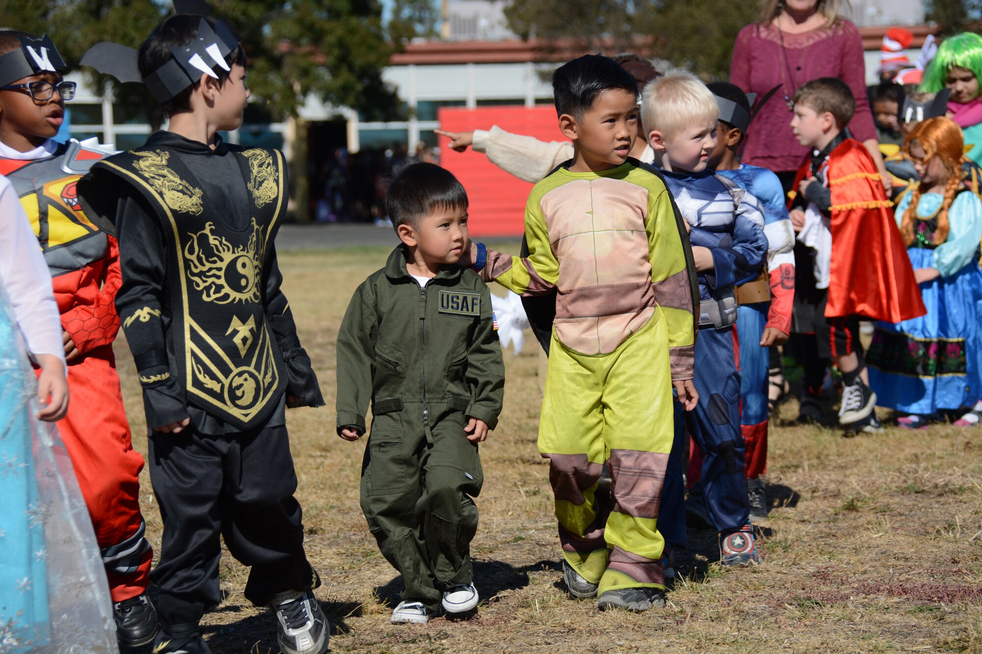 Children dressed up Oct. 30 at Travis Elementary School and held a parade as part of Red Ribbon Week and to celebrate Halloween at Travis Air Force Base, Calif. Red Ribbon Week took place Oct. 26 to 30 and there was a different event for each day that week. (U.S. Air Force photos by Airman 1st Class Amber Carter)