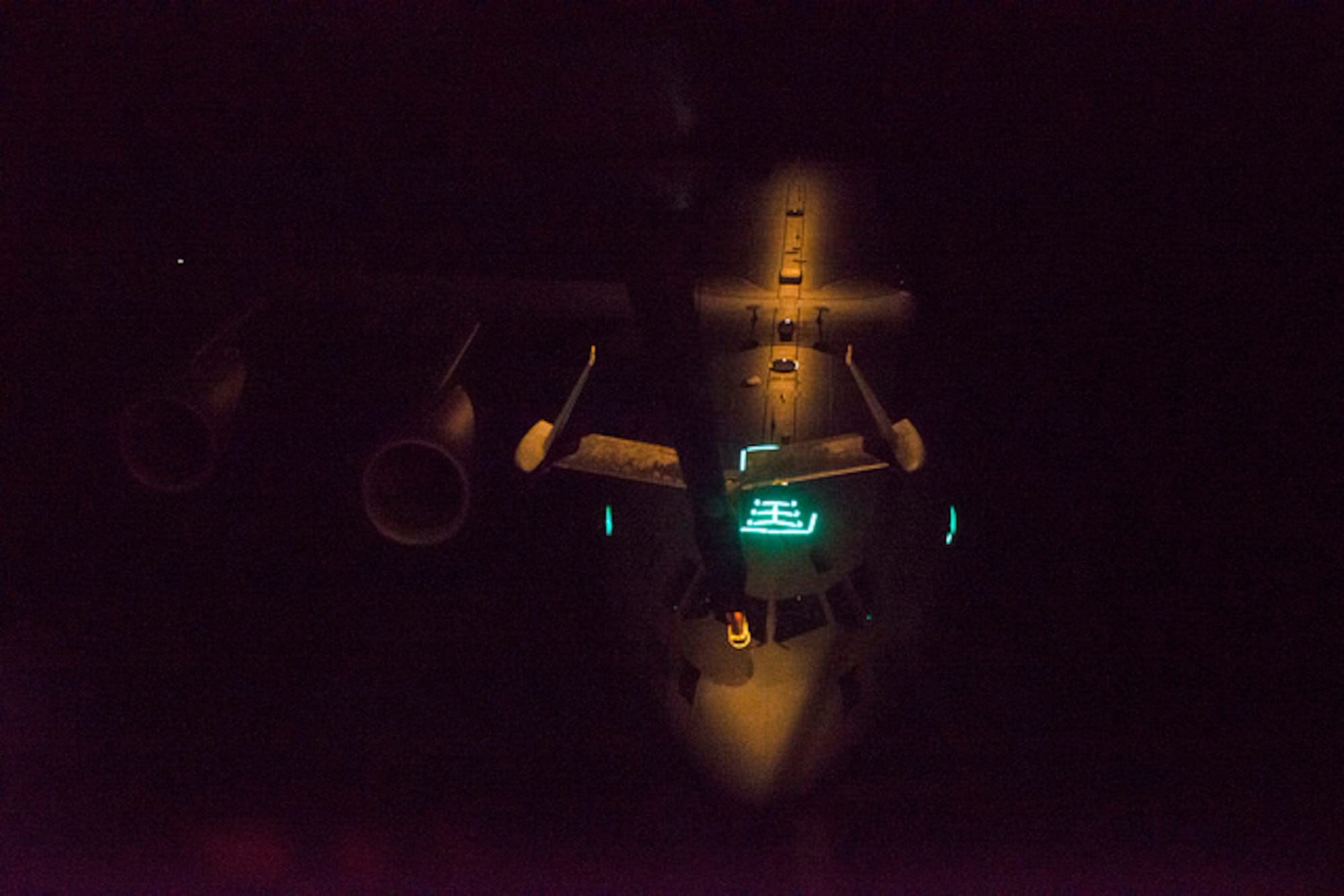 A KC-10 Extender refuels a C-17 Globemaster III over the Atlantic Ocean during Exercise Ultimate Reach, part of Exercise Trident Juncture, Nov. 4, 2015. The mission involved eight KC-10s meeting seven C-17s over the Atlantic, refueling in a large formation overnight. The KC-10s offloaded on average 6,000 gallons of fuel into each C-17, who were then able to continue on across the Atlantic, drop more than 500 airborne troops in Spain. (U.S. Air Force photo by Airman 1st Class Joshua King)