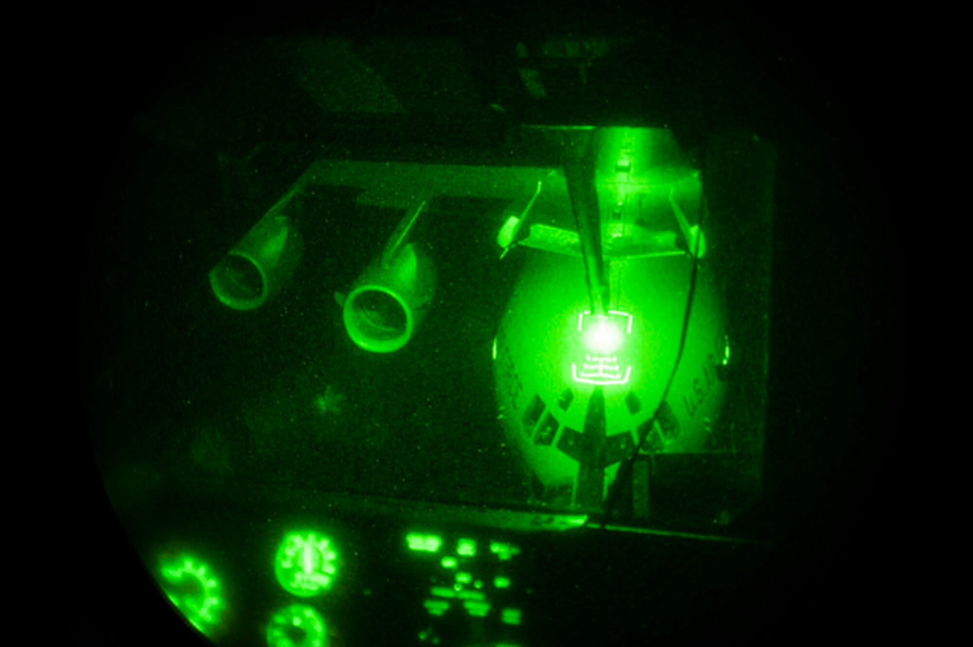 A KC-10 Extender refuels a C-17 Globemaster III over the Atlantic Ocean during Exercise Ultimate Reach, part of Exercise Trident Juncture, Nov. 4, 2015. The mission involved eight KC-10s meeting seven C-17s over the Atlantic, refueling in a large formation overnight. The KC-10s offloaded on average 6,000 gallons of fuel into each C-17, who were then able to continue on across the Atlantic, drop more than 500 airborne troops in Spain. (U.S. Air Force photo by Airman 1st Class Joshua King)