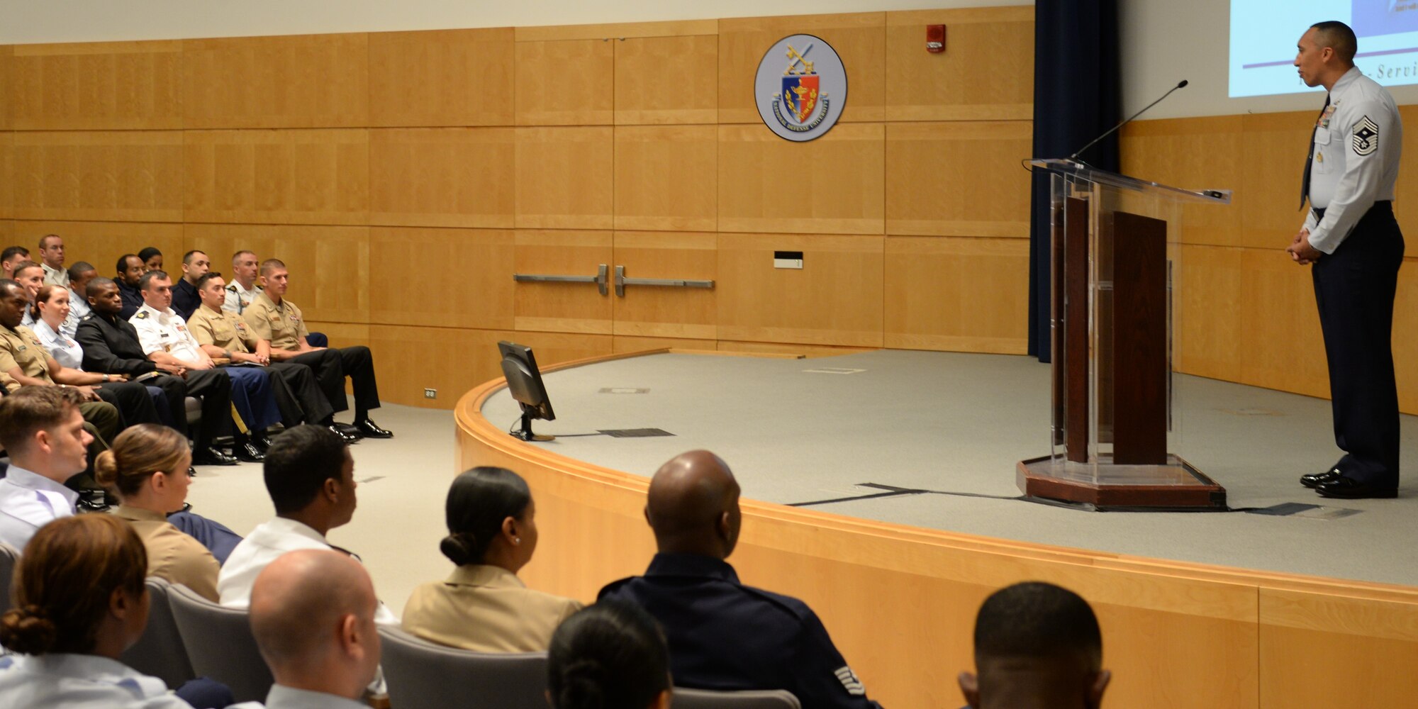 Air Force District of Washington’s First Sergeant, Chief Master Sgt. Manny Pineiro teaches a class on Air Force 101 at the Joint Professional Development Seminar which began Nov. 2, 2015 at the National Defense University. The five-day course is designed to engage Noncommissioned and Petty Officers in deliberate development to equip them to lead through the challenges of the 21st century. (U.S. Air Force photo/1Lt. Esther Willett)