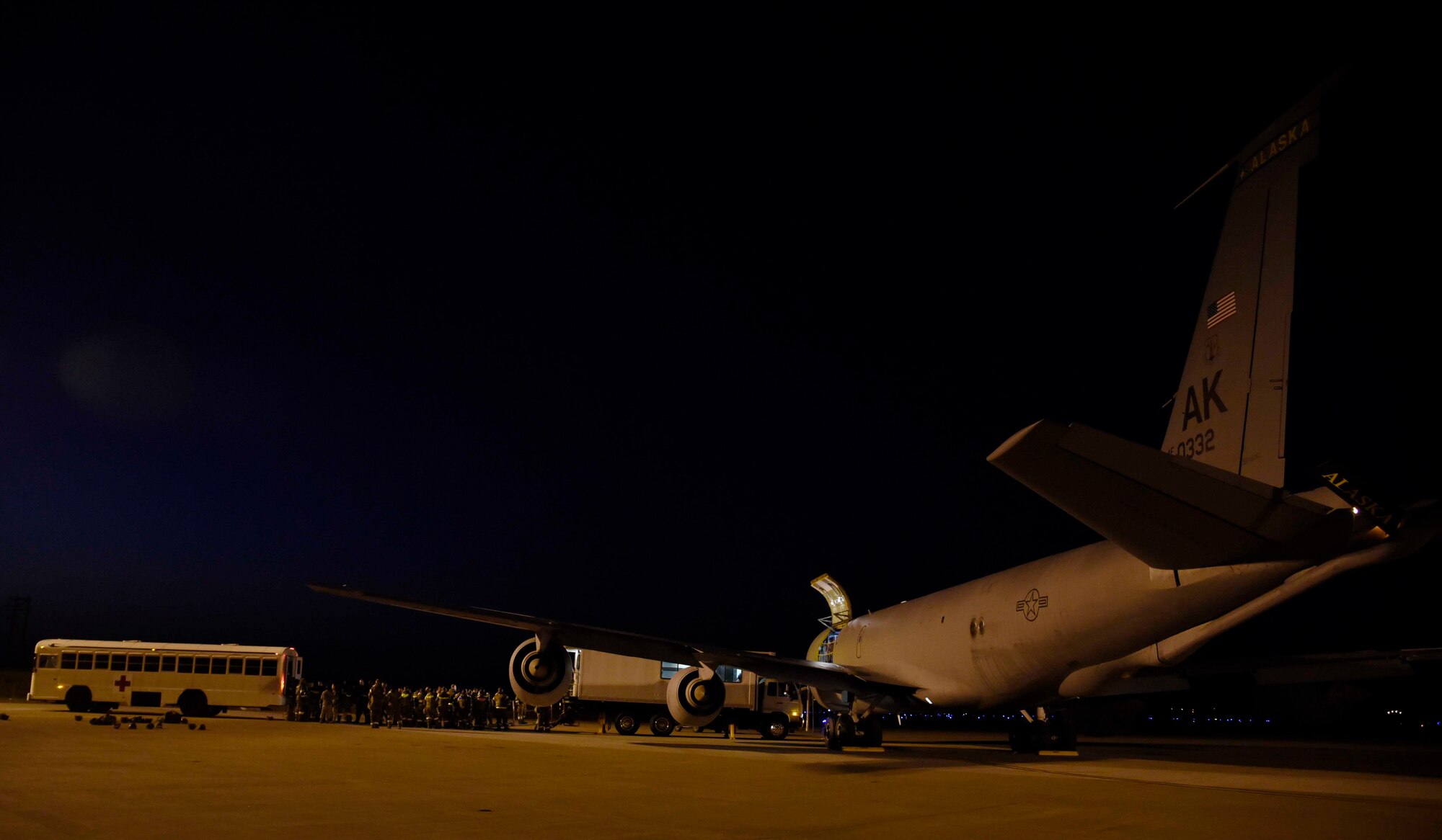 U.S. Air Force Airmen are unloaded from a KC-135 Stratotanker during Vigilant Ace 16 at Misawa Air Base, Japan, Nov. 4, 2015. Although the KC-135 can transport people, its main mission is aerial refueling of Air Force, Navy and Marine Corps aircraft. (U.S. Air Force photo by Airman 1st Class Jordyn Fetter/Released)