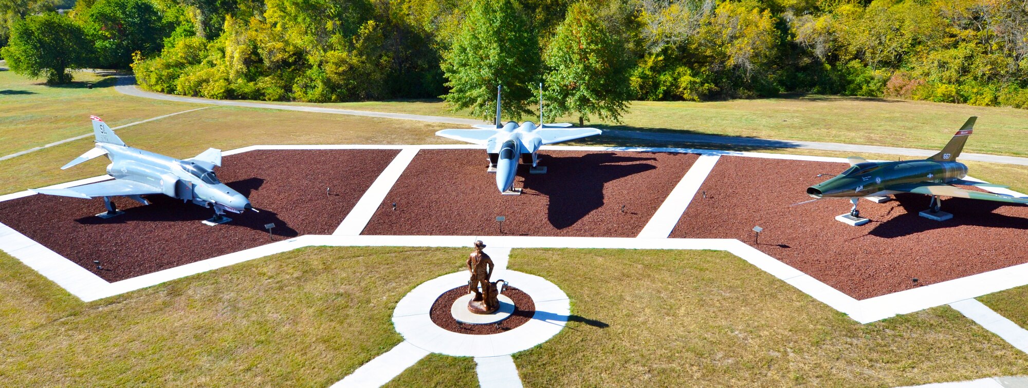 The Missouri Air National Guard's 131st Bomb Wing Heritage Park officially opened in June, 2015, at Whiteman Air Force Base, Missouri, and the installation is now complete with the recent addition of lava rock around the base of each aircraft and the Minuteman statue.  (U.S. Air National Guard photo by Senior Master Sgt. Mary-Dale Amison)