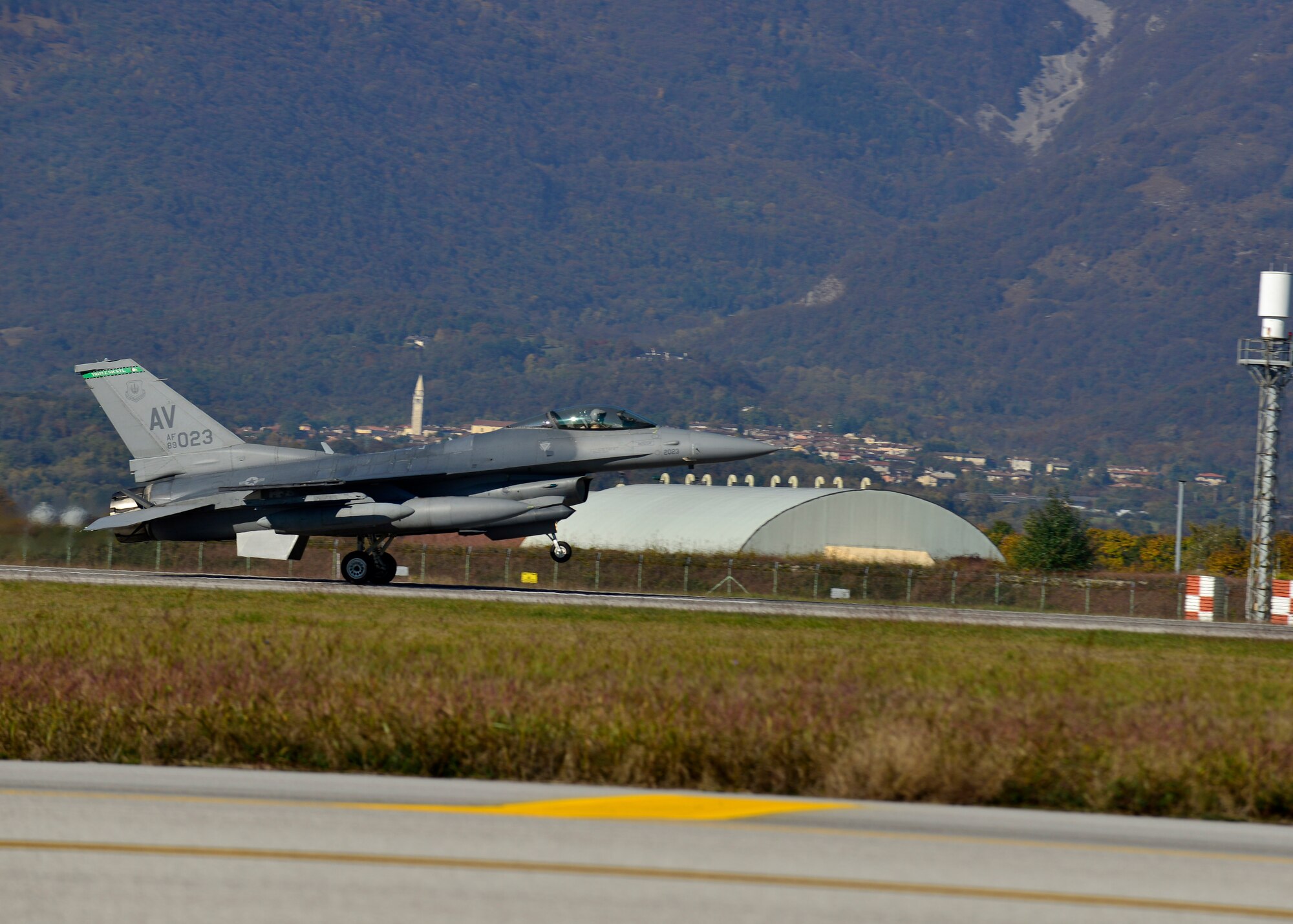 An F-16C Fighting Falcon of the 55th Fighter Squadron returns from a deployment, Nov. 3, 2015, at Aviano Air Base, Italy. The 555th FS and Aircraft Maintenance Unit deployed more than 300 maintenance and support personnel in support of Operation New Dawn. (U.S. Air Force photo by Airman 1st Class Cary Smith/Released)