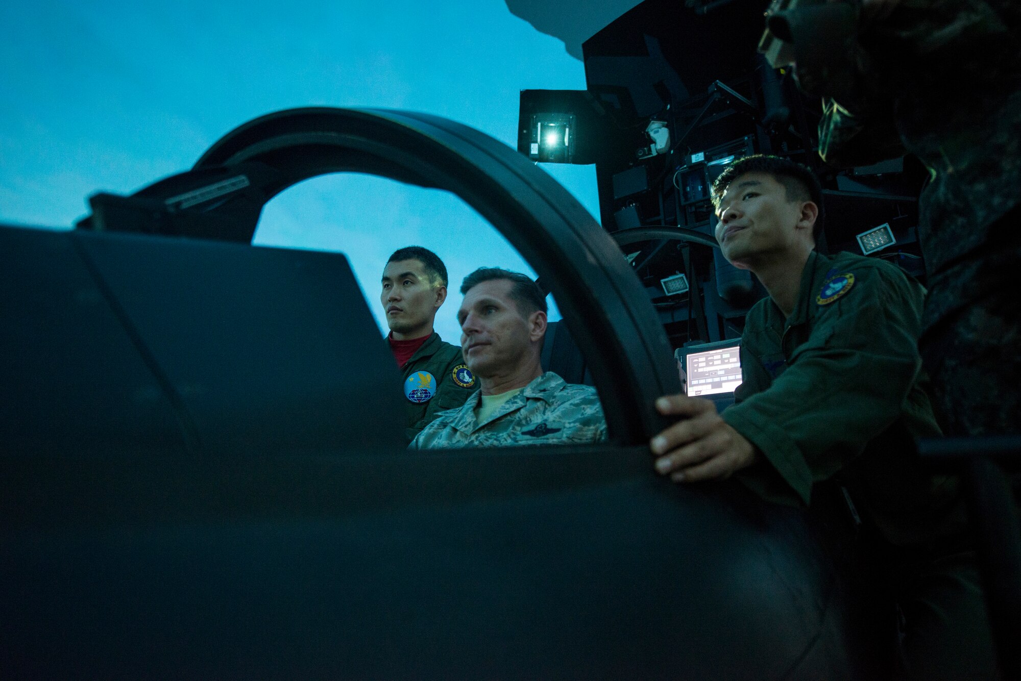 Pilot instructors from the Republic of Korea 1st Fighter wing show U.S. Air Force Brig. Gen. Barry Cornish, 18th Wing commander, a T-50 flight simulator Nov. 5, 2015, at Gwangju Air Base, Republic of Korea. Cornish visited Gwangju AB to assess the 18th Wing’s mission capability during exercise Vigilant Ace 16. (U.S. Air Force photo by Senior Airman Omari Bernard)