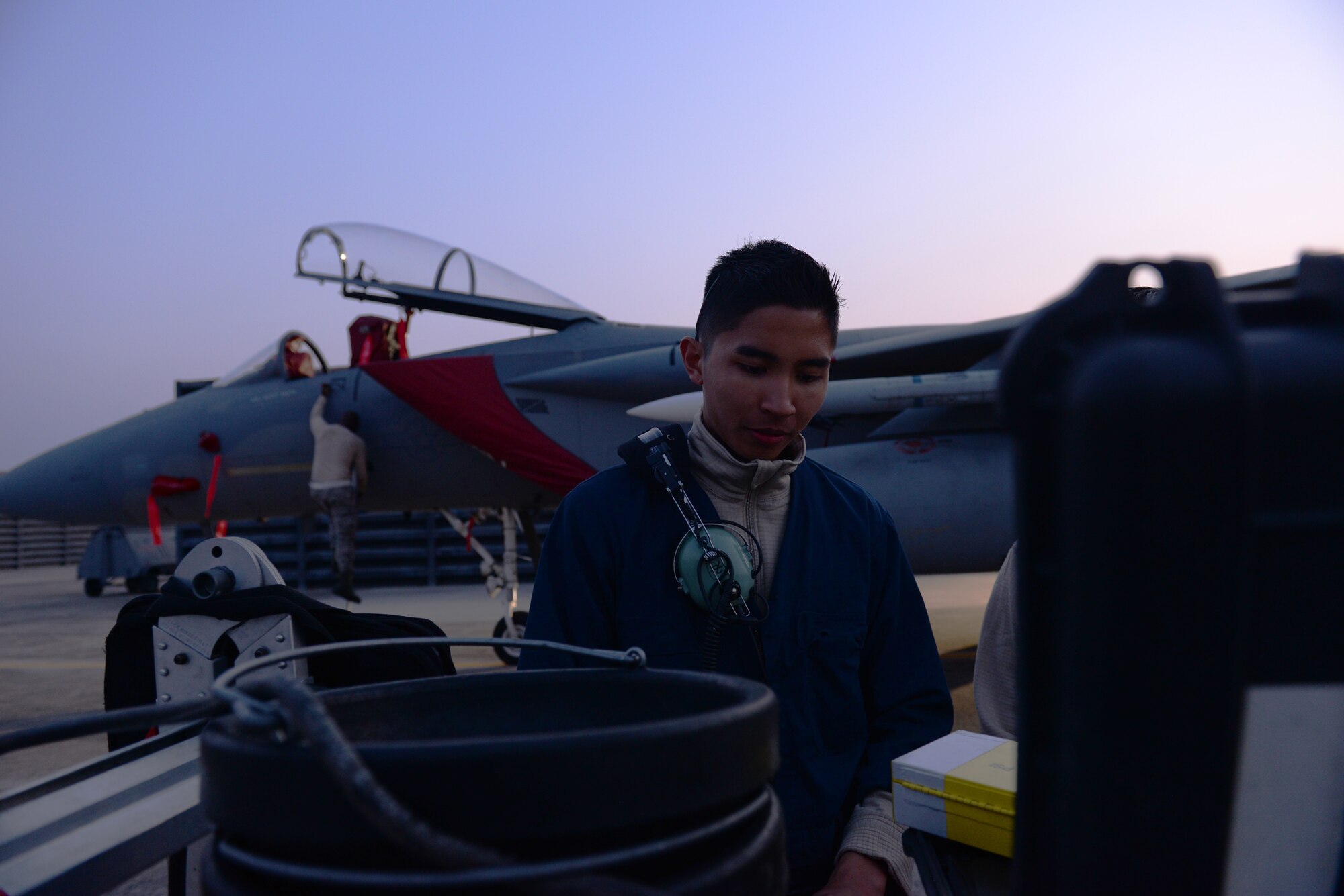 Senior Airman Dennis Franco, 67th Fighter Squadron Aircraft Maintenance Unit crew chief, performs after-maintenance checks on an F-15 Eagle Nov. 2, 2015, at Gwangju Air Base, Republic of Korea. Vigilant Ace 16 gives Airmen from Kadena Air Base, Japan, the opportunity to train like they would fight in a deployed environment. (U.S. Air Force photo by Senior Airman Omari Bernard)