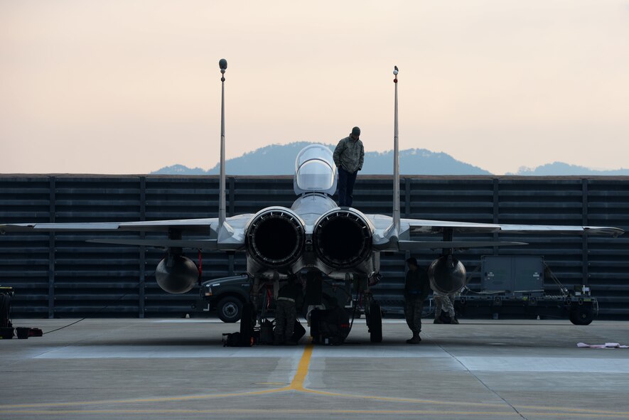 Airmen from the 67th Fighter Squadron Aircraft Maintenance Unit inspect an F-15 Eagle after it arrives from Kadena Air Base, Japan, in support of Vigilant Ace 16 Nov. 2, 2015, at Gwangju Air Base, Republic of Korea. Vigilant Ace 16 is a peninsula-wide training event designed to test the readiness of U.S. and Republic of Korea forces. (U.S. Air Force photo by Senior Airman Omari Bernard)