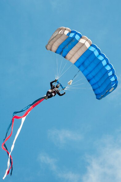 A member of the U.S. Air Force Academy Wings of Blue parachute team glides to safety during the Thunder Over South Georgia, Nov. 7, 2015, at Moody Air Force Base, Ga. The team is part of the Airmanship 490 Basic Freefall Parachuting program from the 98th Flying Training Squadron stationed in Colorado. (U.S. Air Force photo by Airman 1st Class Kathleen D. Bryant/Released)