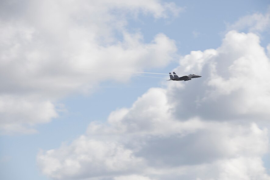 An F-15E Strike Eagle shows its capabilities during the Thunder Over South Georgia Nov. 7, 2015, at Moody Air Force Base, Ga. The flying demonstration included minimum radius turns, zoom climbs, crisp rolls, and dirty passes. (U.S. Air Force photo by Airman 1st Class Greg Nash/Released)