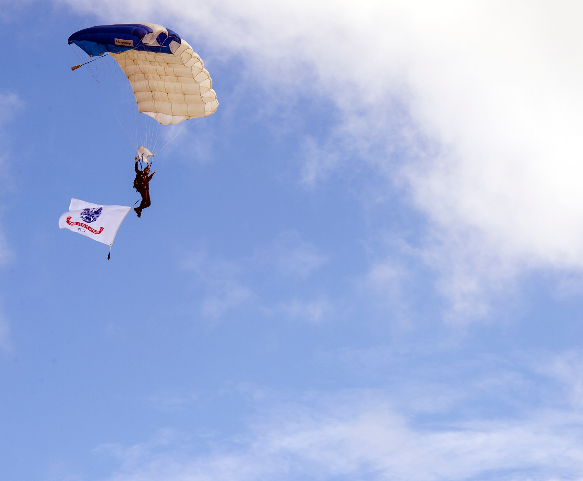 A member of the United States Air Force Academy Wings of Blue parachute team descends for a safe landing during the Thunder Over South Georgia, Nov. 7, 2015, at Moody Air Force Base, Ga. The Wings of Blue’s primary mission is to run the Air Force Basic Freefall Parachuting course, known as Airmanship 490 (AM-490.) (U.S. Air Force photo by Airman 1st Class Greg Nash/Released)  