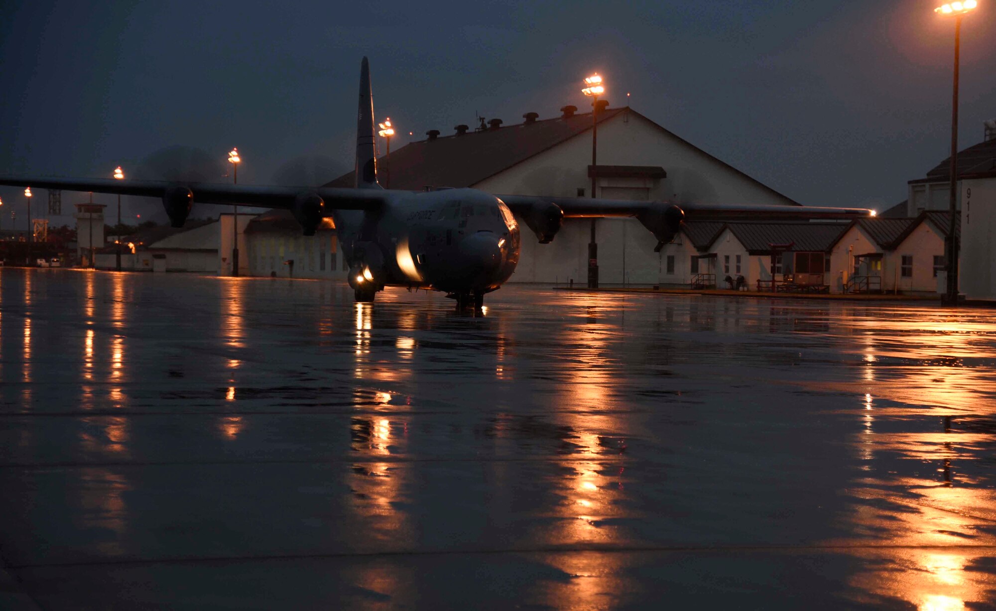 A U.S. Air Force C-130 Hercules taxis down the runway at Misawa Air Base, Japan, Nov. 2, 2015. More than 300 Misawa Airmen were deployed to Osan Air Base, Republic of Korea, via C-130s as part of exercise Vigilant Ace 16. (U.S. Air Force photo by Airman 1st Class Jordyn Fetter/Released)