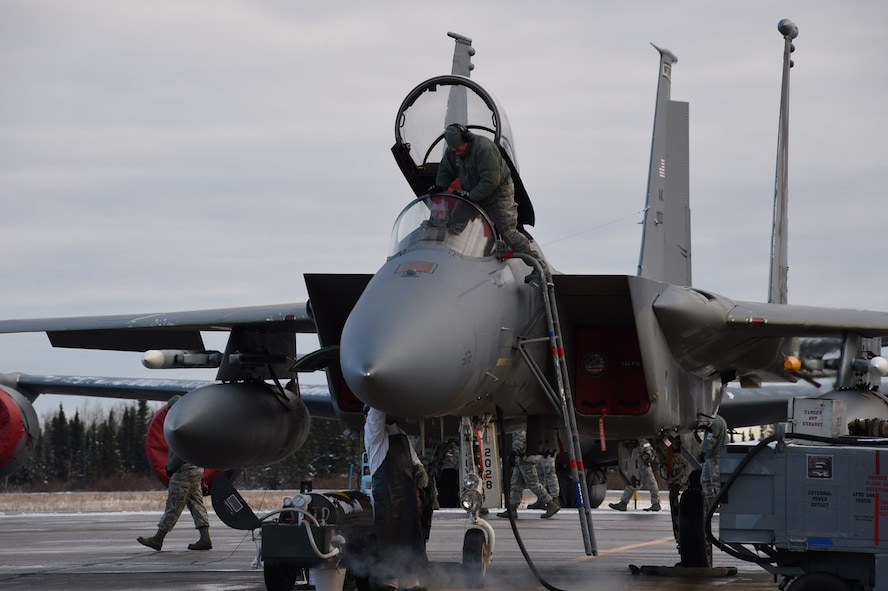 U.S. Airmen with the 144th Fighter Wing prepare a United States Air Force F-15C Eagle for the first mission at 5 Wing Goose Bay, Canada, Oct. 19, 2015. The personnel and fighter jet are participating in Vigilant Shield 16. From Oct. 15-26, 2015 approximately 700 members from the Canadian Armed Forces, the United States Air Force, the United States Navy, and the United States Air National Guard are deploying to Iqaluit, Nunavut, and 5 Wing Goose Bay, Newfoundland and Labrador for Exercise Vigilant Shield 16. (U.S. Air National Guard photo by Senior Master Sgt. Chris Drudge)