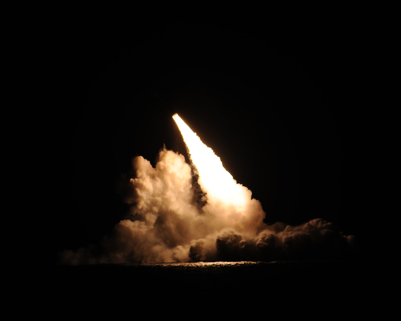 A trident II D-5 ballistic missile is launched from the Ohio-class ballistic missile submarine USS Kentucky (SSBN 737) during a missile test at the Pacific Test Range, Nov. 7, 2015. The launch, the 156th successful test flight of an unarmed Trident II D5 missile, was part of a Demonstration and Shakedown Operation (DASO) in the Pacific Test Range to validate the readiness and effectiveness of an SSBN's crew and weapon system. Strategic weapons tests, along with exercises and operations, demonstrate the readiness of the nation's nuclear triad, assuring America's allies and deterring potential adversaries. One of nine DoD unified combatant commands, USSTRATCOM has global strategic missions, assigned through the Unified Command Plan, which include strategic deterrence; space operations; cyberspace operations; joint electronic warfare; global strike; missile defense; intelligence, surveillance and reconnaissance; combating weapons of mass destruction; and analysis and targeting. (U.S. Navy photo/Released)