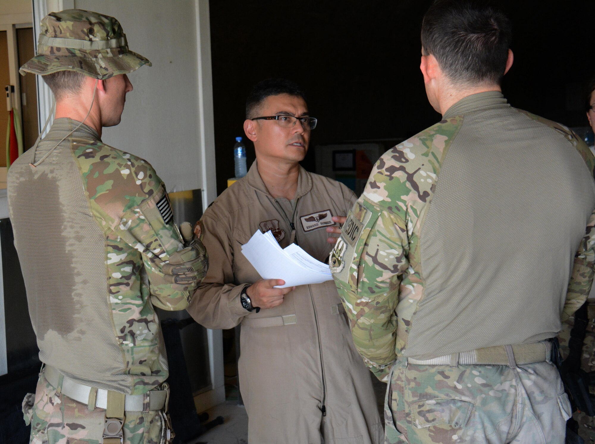 Lt. Col. Edward Bosner, 379th Expeditionary Aeromedical Evacuation Squadron flight nurse, verifies patient accountability during a mass-casualty exercise at Al Udeid Air Base, Qatar Nov. 6. The exercise provided medical teams with an opportunity to provide care for patients in a mass-casualty situation. Teams were evaluated on set up, patient movement and communication. (U.S. Air Force photo by Tech. Sgt. James Hodgman)
