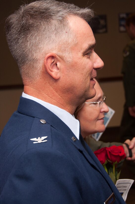 U.S. Air Force Col. David Leedom, former Reserve Advisor to the 8th Air Force Commander, and his wife Linda stand in the receiving line after his retirement ceremony. Leedom is retiring after 27 years of service. The eagles on his retirement uniform were his father’s. (U.S. Air Force photo by Master Sgt. Laura Siebert/Released)
