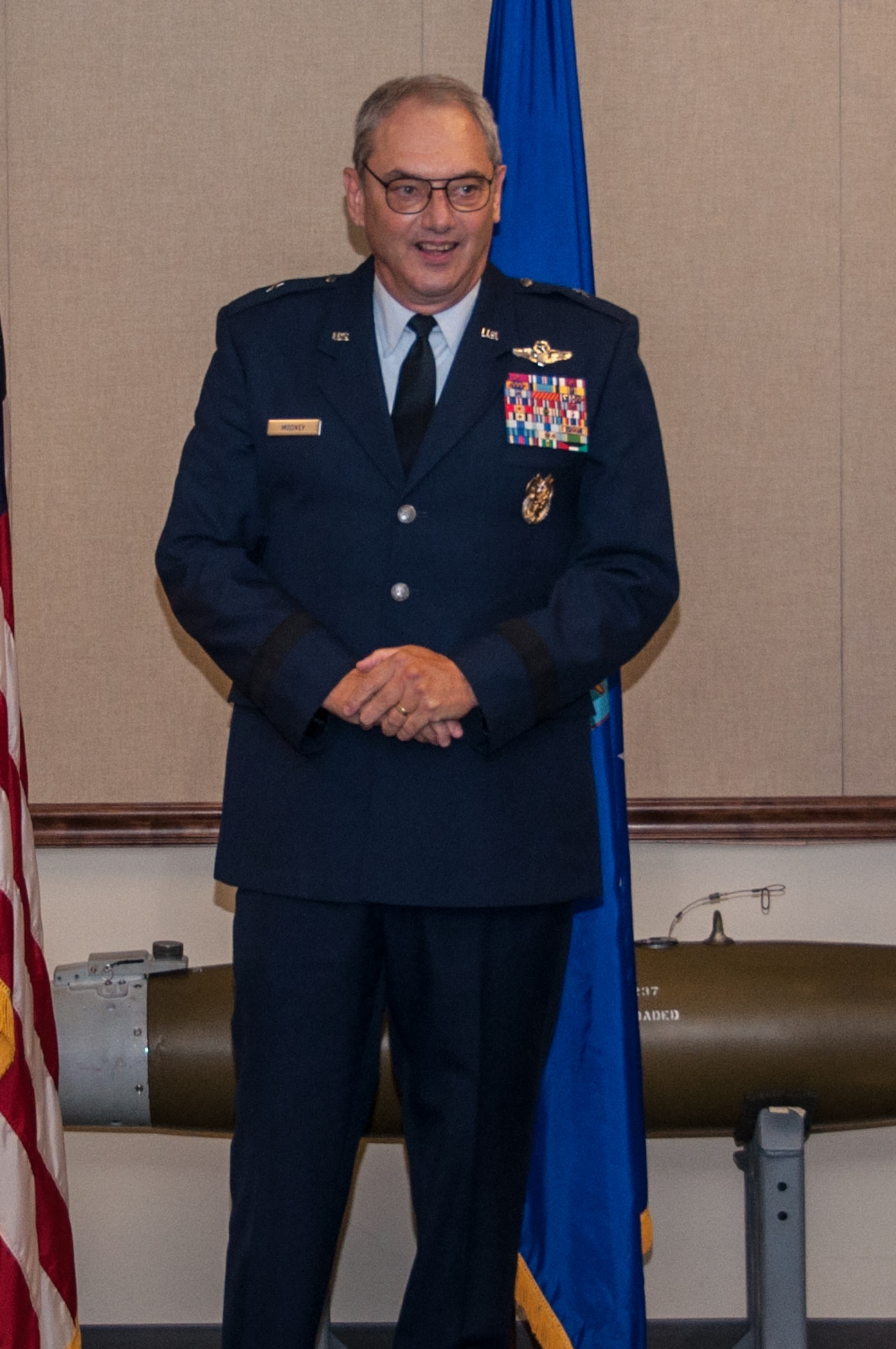 U.S. Air Force Brig. Gen. John Mooney, Air Force Reserve Inspection General, speaks at Col. David Leedom’s retirement ceremony October30, 2015 at Barksdale Air Force Base. Leedom is retiring after 27 years as a pilot of the B-52 Stratofortress. His last assignment was as the Air Force Reserve Advisor to the commander of 8th Air Force. (U.S. Air Force photo by Master Sgt. Laura Siebert/Released)