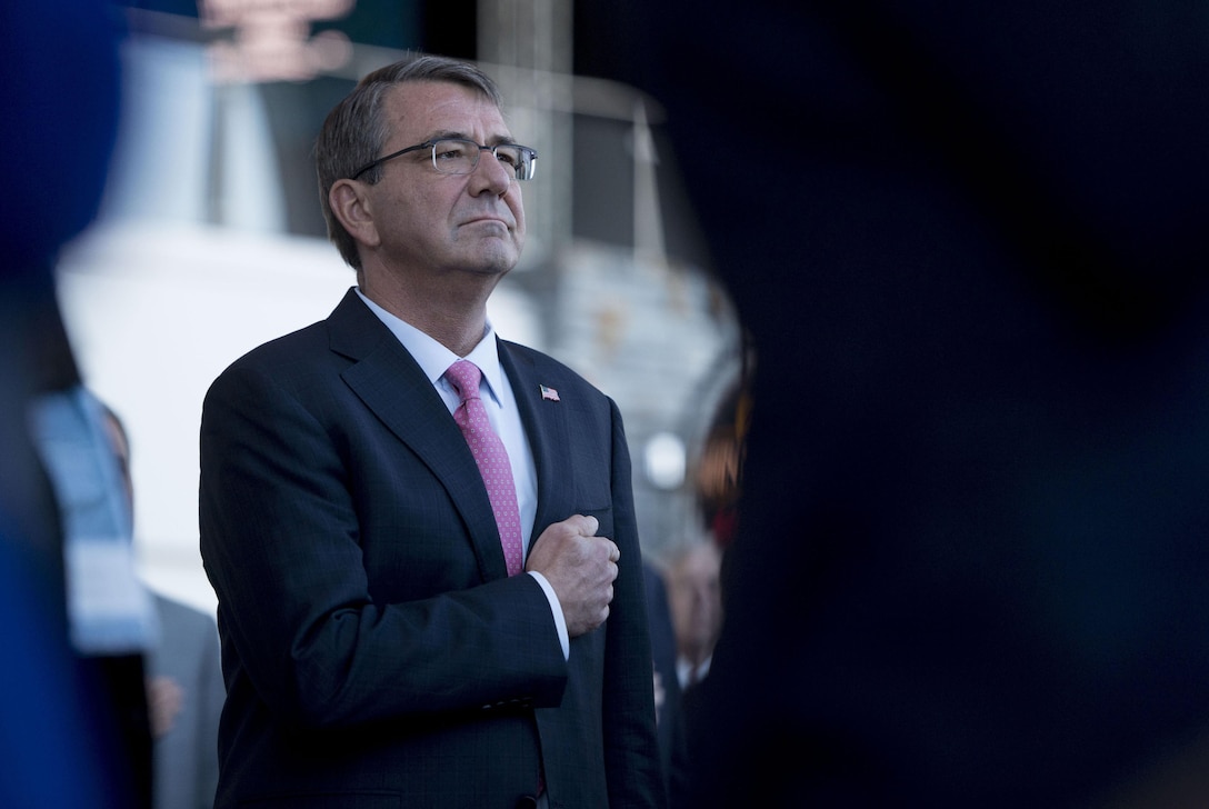Defense Secretary Ash Carter renders honors during the singing of the national anthem at the Reagan National Defense Forum in Simi Valley, Calif., Nov. 7, 2015. DoD photo by Air Force Senior Master Sgt. Adrian Cadiz