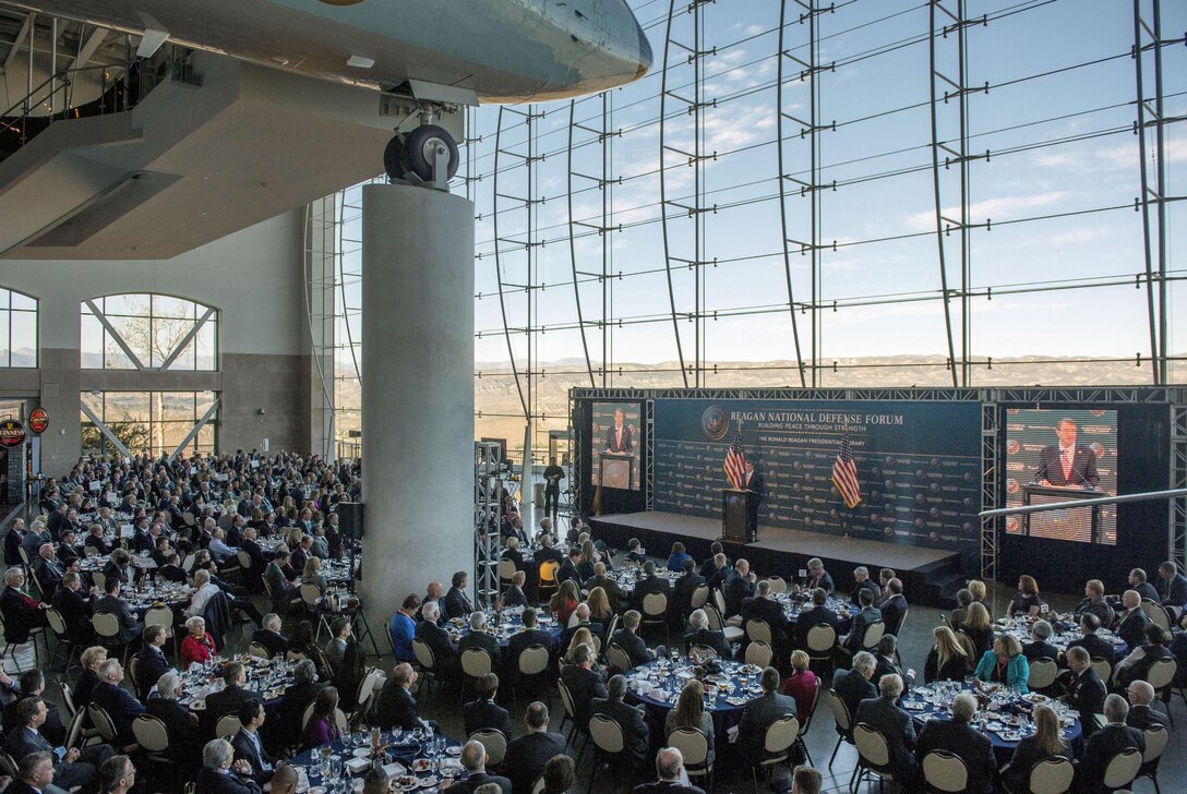 Attendees in the Ronald Reagan Presidential Library's Air Force One Pavilion listen as Defense Secretary Ash Carter delivers keynote remarks at the Reagan National Defense Forum in Simi Valley, Calif., Nov. 7, 2015. DoD photo by Air Force Senior Master Sgt. Adrian Cadiz
