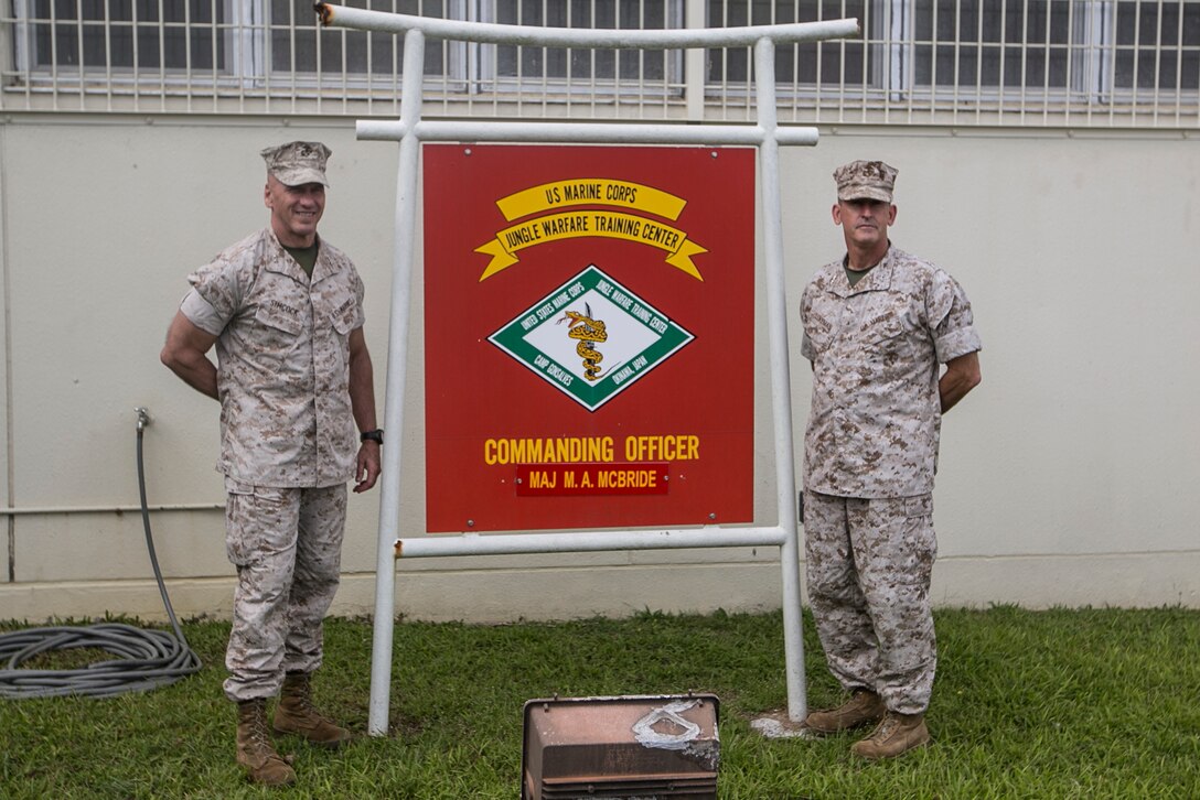 Maj. Gen. Richard Simcock, left, and Maj. Gen. James W. Lukeman pose for a photo outside of the Jungle Warfare Training Facility, Oct. 30, aboard Camp Gonsalves, Okinawa, Japan. Lukeman received a tour of the facility’s obstacle courses and ranges. Lukeman, a Beaufort, South Carolina, native, is the commanding general with Training and Education Command. Simcock is the commanding general with III Marine Division, III Marine Expeditionary Force.