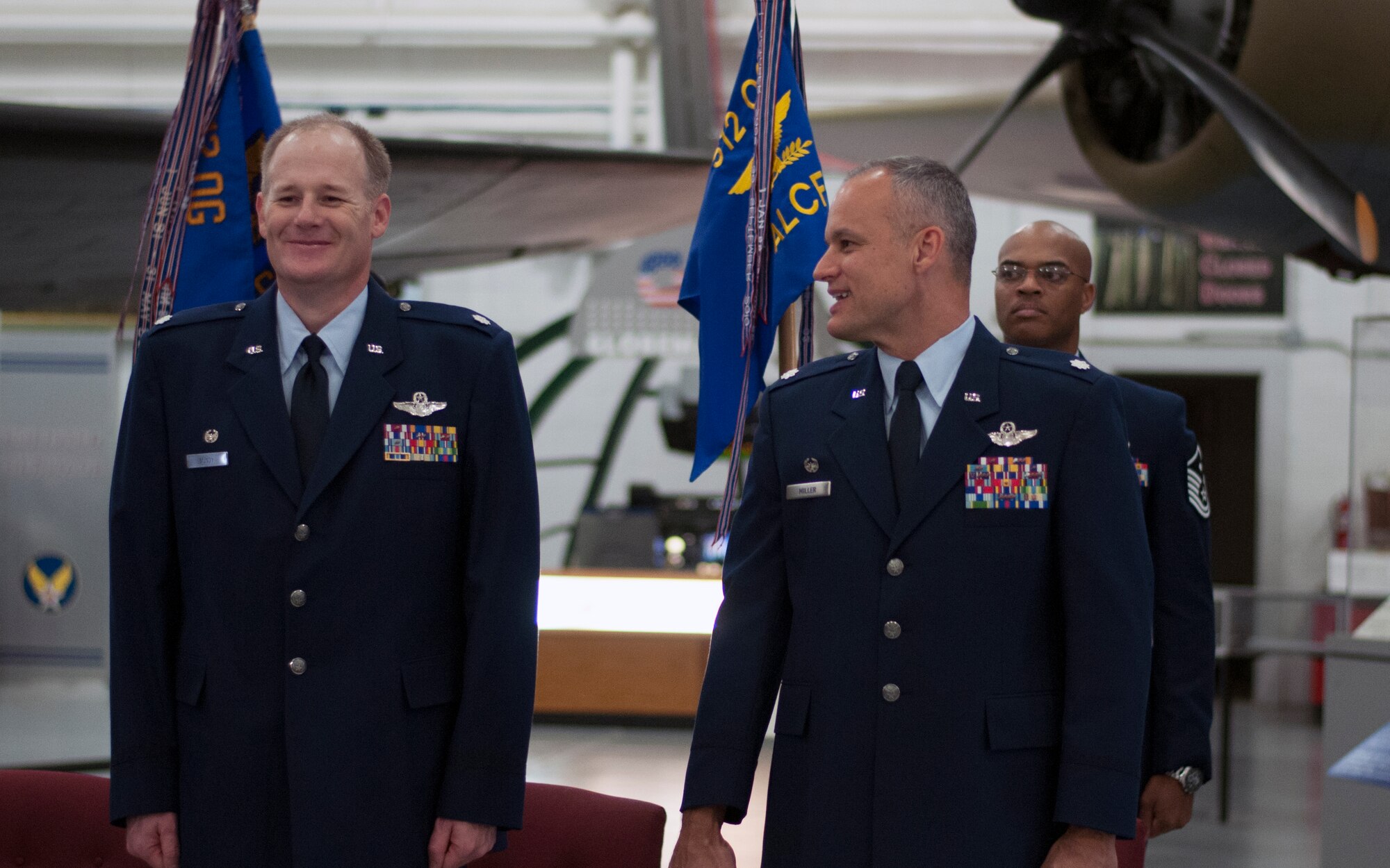 Lt. Col. Michael Mundy (left), incoming 512th Operations Support Squadron commander, and Lt. Col. Jay Miller (right), incoming 512th Airlift Control Flight commander, share a laugh before the start of the 512th Operations Group assumption of command and change of command ceremonies, Nov. 7, 2015 on Dover Air Force Base, Del. The 512th OG held simultaneous ceremonies for three new reserve commanders and organizations here during the November Unit Training Assembly. (U.S. Air Force photo/1st Lt. Steve Lewis)