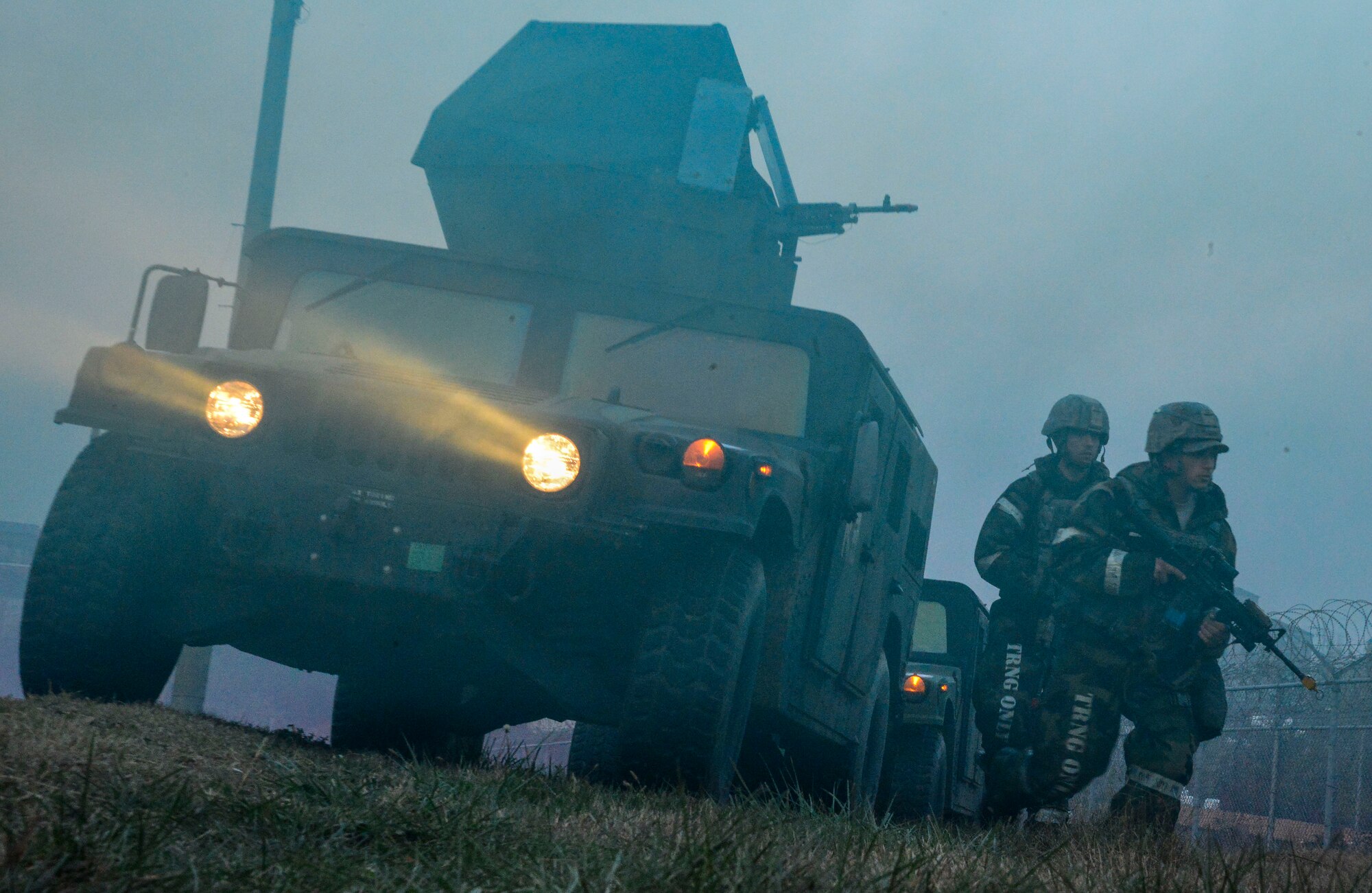 Defenders from the 51st Security Forces Squadron search for opposing forces during readiness exercise Vigilant Ace 16 on Osan Air Base, Republic of Korea, Nov. 4, 2015. Vigilant Ace 16 is a peninsula-wide exercise with more than 16,000 participants including augmentees from U.S. air bases in Japan. During the exercise, U.S. and ROK forces demonstrated the ability to operate in a chemical environment as well as administer medical assistance in a wartime environment. (U.S. Air Force photo/Senior Airman Kristin High)