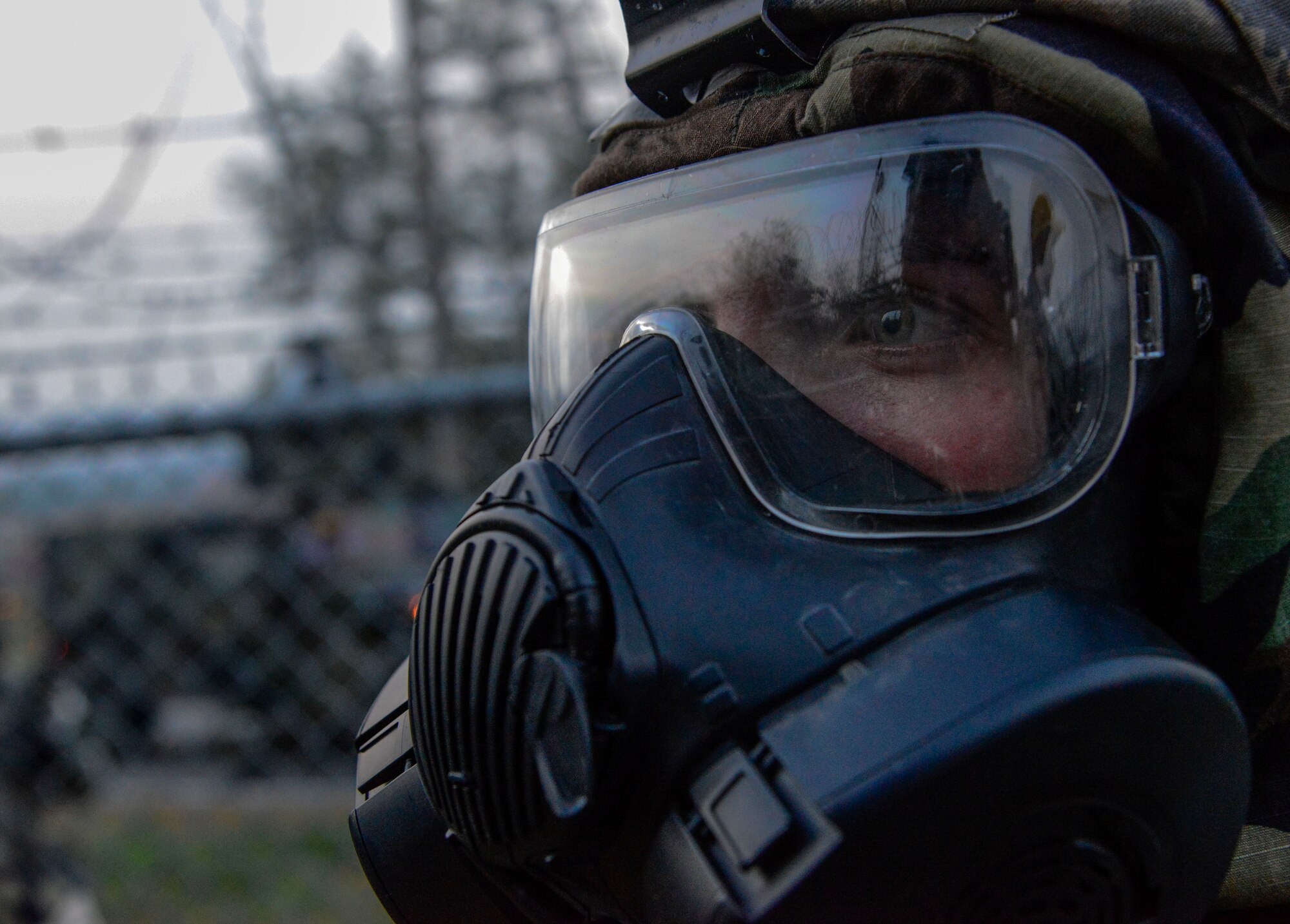 Airman 1st Class Emily Downer, 51st Security Forces Squadron, listens to an outbrief after a simulated opposing forces attack during readiness exercise Vigilant Ace 16 on Osan Air Base, Republic of Korea, Nov. 4, 2015. Vigilant Ace 16 is designed to enhance the interoperability of U.S. and ROK forces through combined and joint combat training. (U.S. Air Force photo/Senior Airman Kristin High)