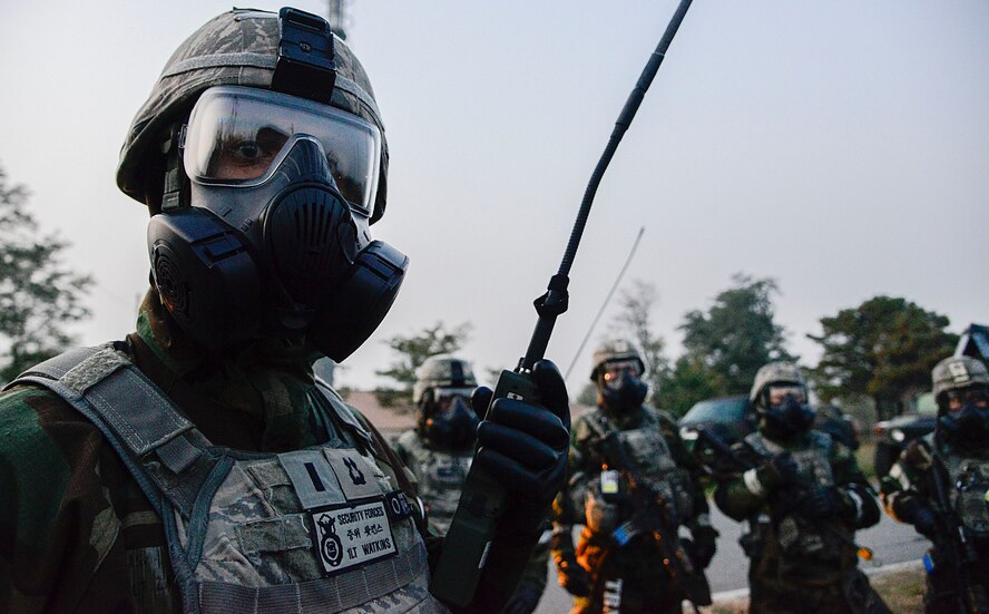 1st Lt. Zachary Watkins, 51st Security Forces Squadron Alpha and Bravo flight commander, gives an outbrief to Airmen after a simulated opposing forces attack during readiness exercise Vigilant Ace 16 on Osan Air Base, Republic of Korea, Nov. 4, 2015. During the attacks the defenders practiced base defense to help with responding to real world contingencies. Vigilant Ace 16, a peninsula-wide exercise, involving more than 16,000 participants. (U.S. Air Force photo/Senior Airman Kristin High)