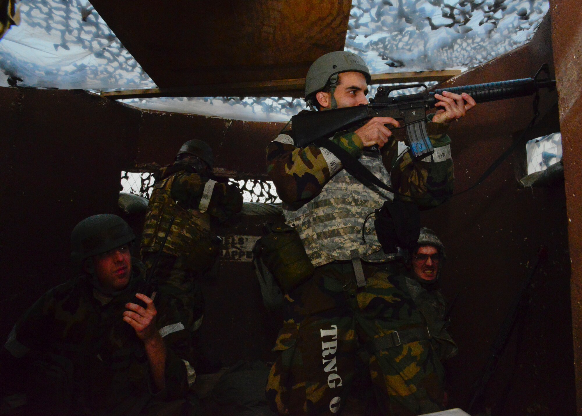 Defenders from the 51st Security Forces Squadron guard and defend against opposing forces throughout a simulated attack during readiness exercise Vigilant Ace 16, on Osan Air Base, Republic of Korea, Nov. 4, 2015. The exercise provided defenders the opportunity to train in various scenarios and gain combat knowledge and skills in the event of real-world contingencies. (U.S. Air Force photo/Senior Airman Kristin High)
