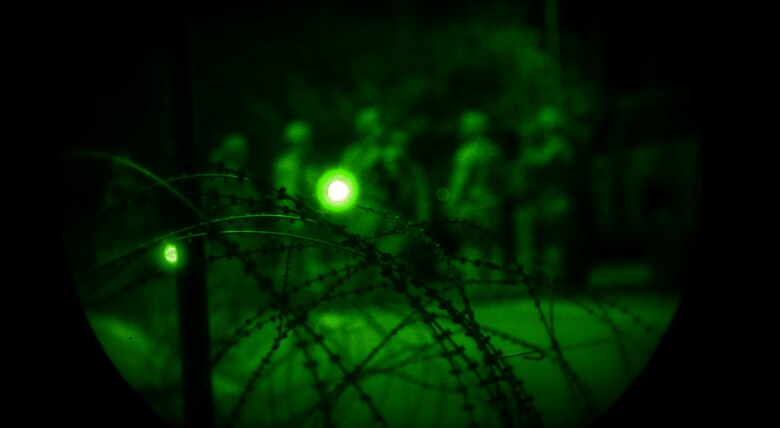 Airmen from the 51st Security Forces Squadron discuss operational requirements during Exercise Vigilant Ace 16 on Osan Air Base, Republic of Korea, Nov. 2, 2015. More than 16,000 U.S. personnel will participate in Vigilant Ace 16, an annual exercise that tests the linkage between operational-level planners and tactical units, including an increased ROK air force presence. (U.S. Air Force photo/Tech. Sgt. Travis Edwards)