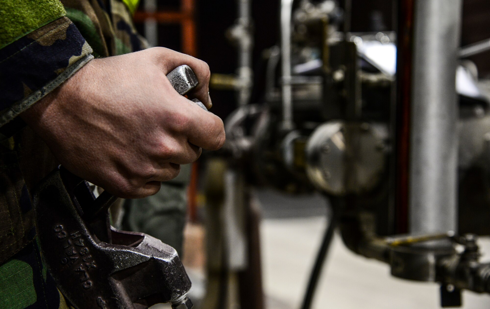 A 51st Logistics Readiness Squadron fuels flight aircraft refueling specialist, pumps JP-8 jet fuel into an R-11 fuel truck during exercise Vigilant Ace 16 at Osan Air Base, Republic of Korea, Nov. 4, 2015. The first generation of the mobile fuel truck was delivered in 1989 by the Oshkosh Truck Corporation. More than 16,000 U.S. personnel will participate in Vigilant Ace 16, an annual exercise that tests the linkage between operational-level planners and tactical units, including an increased ROK air force presence. (U.S. Air Force photo/Tech. Sgt. Travis Edwards)