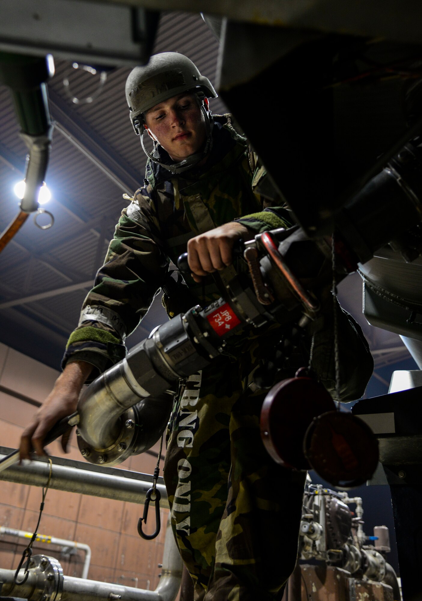 Airman 1st Class Lucas Amodeo, 51st Logistics Readiness Squadron fuels flight aircraft refueling specialist, removes a pantograph refueling arm after fueling up an R-11 mobile fuel truck during exercise Vigilant Ace 16 at Osan Air Base, Republic of Korea, Nov. 4, 2015. The R-11 tanker can hold up to 6,000 gallons or 40,000 pounds of fuel and can issue it out at 600 gallons or 4,000 pounds of fuel per minute. More than 16,000 U.S. personnel will participate in Vigilant Ace 16, a large-scale training exercise that helps prepare the alliance to respond to any potential contingencies and to defend the Republic of Korea. (U.S. Air Force photo/Tech. Sgt. Travis Edwards)