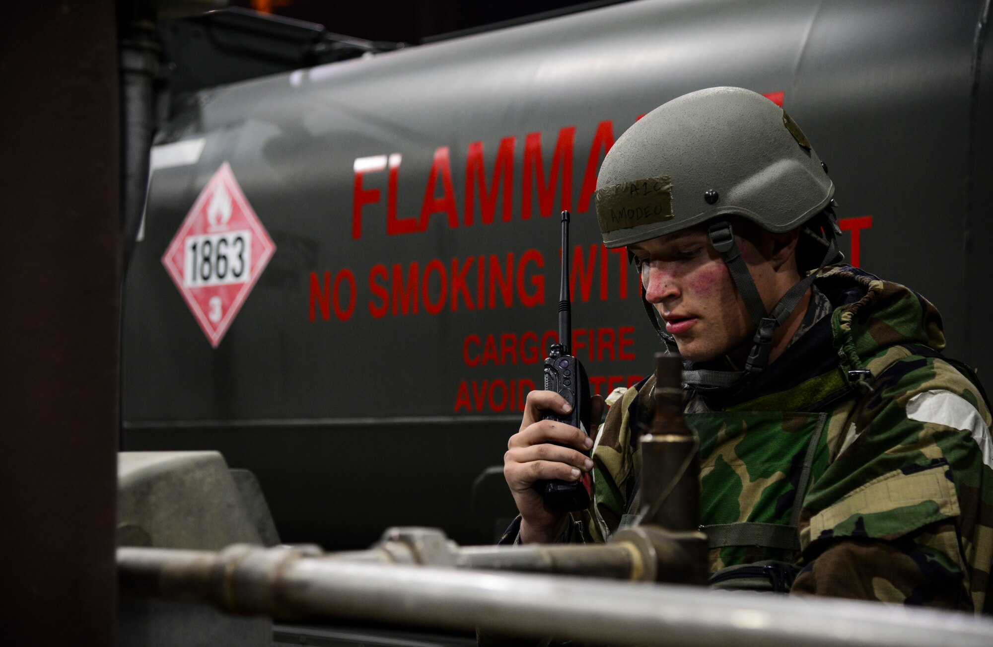 Airman 1st Class Lucas Amodeo, 51st Logistics Readiness Squadron fuels flight aircraft refueling specialist, calls dispatch to check for the next parched aircraft awaiting a refuel from an R-11 mobile fuel truck during exercise Vigilant Ace 16 at Osan Air Base, Republic of Korea, Nov. 4, 2015. The R-11 is primary mobile refueling vehicle for the Air Force and can pump approximately 4,000 pounds of fuel per minute. Exercise Vigilant Ace 16 is a peninsula-wide readiness exercise focused on strengthening the ROK and U.S. alliance. (U.S. Air Force photo/Tech. Sgt. Travis Edwards)