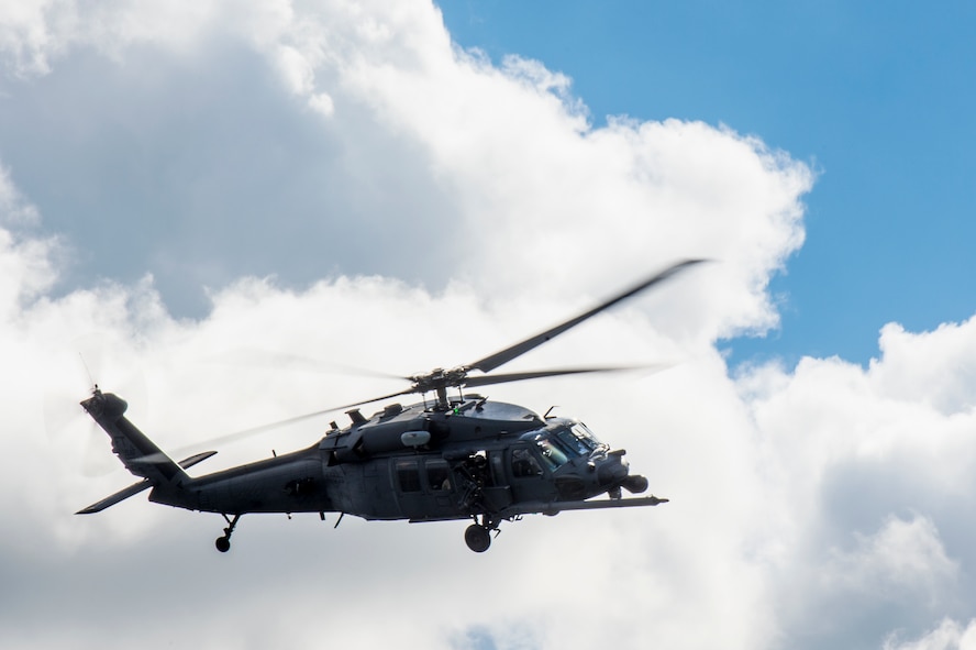 An HH-60G Pave Hawk flies during a combat search and rescue demonstration during the Thunder Over South Georgia Open House practice, Nov. 6, 2015, at Moody Air Force Base, Ga.  HH-60G pilots primarily conduct personnel recovery operations including search and rescue, medical evacuation and humanitarian assistance missions. (U.S. Air Force photo by Senior Airman Ryan Callaghan/Released)
